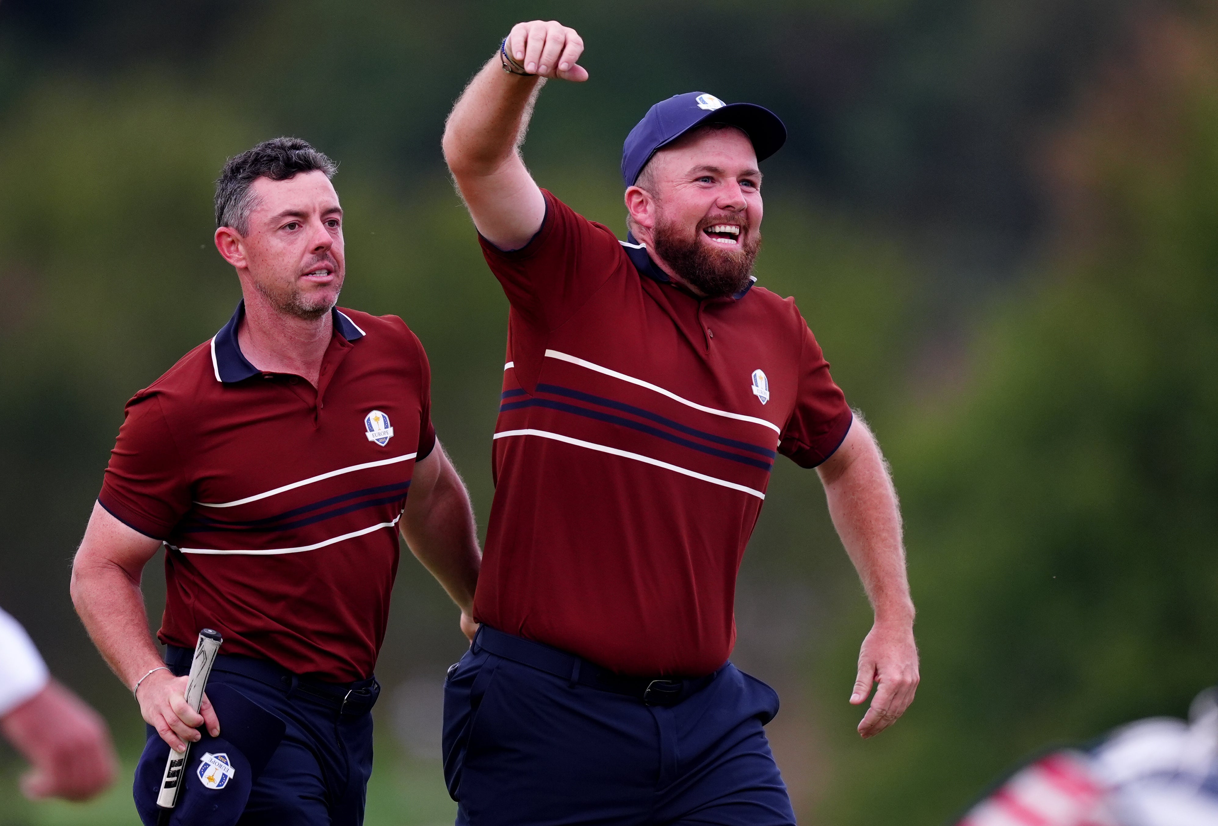 McIlroy and Lowry overcame the distractions to score a brilliant win (Mike Egerton/PA)