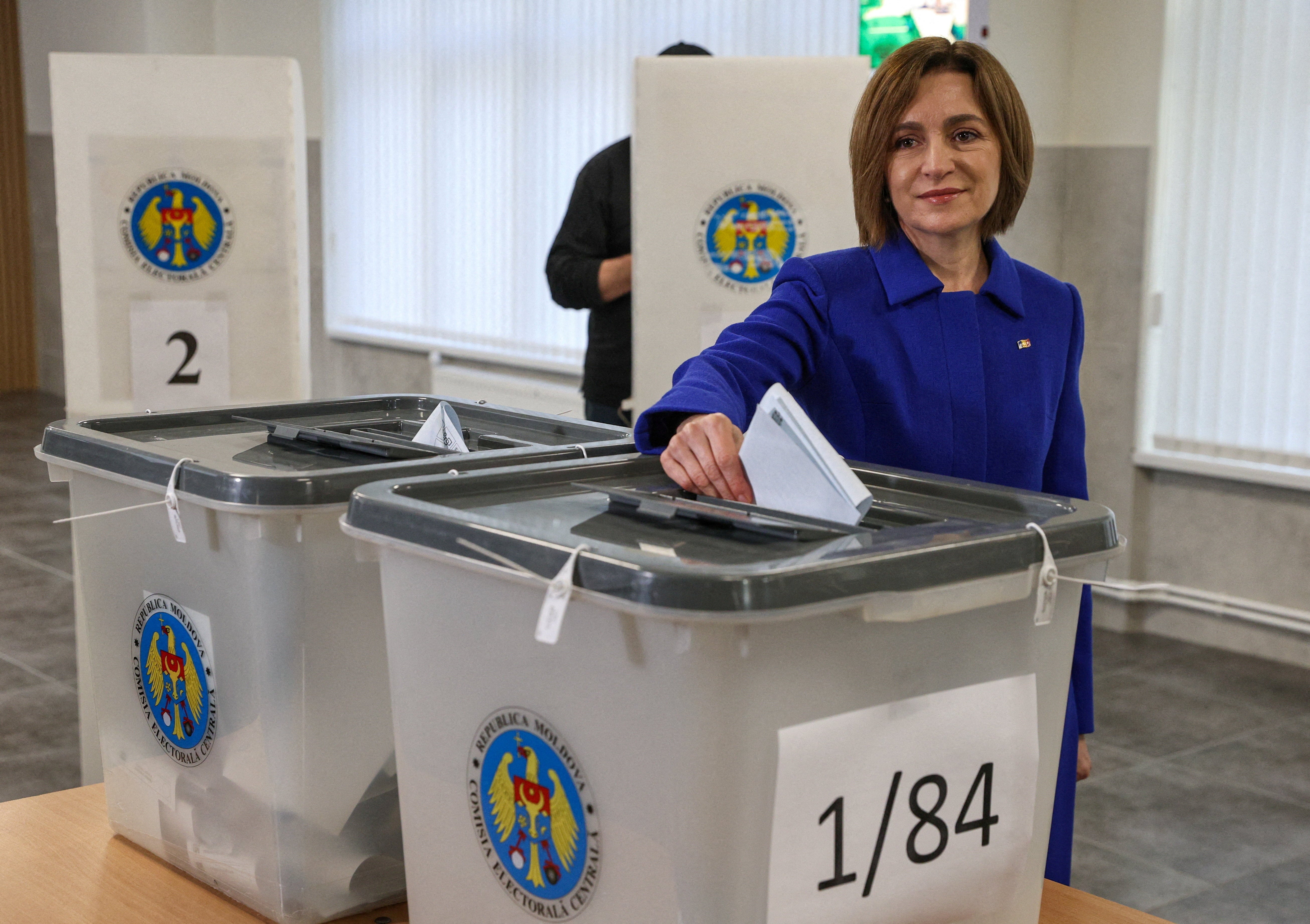 Moldovan President Maia Sandu votes at a polling station