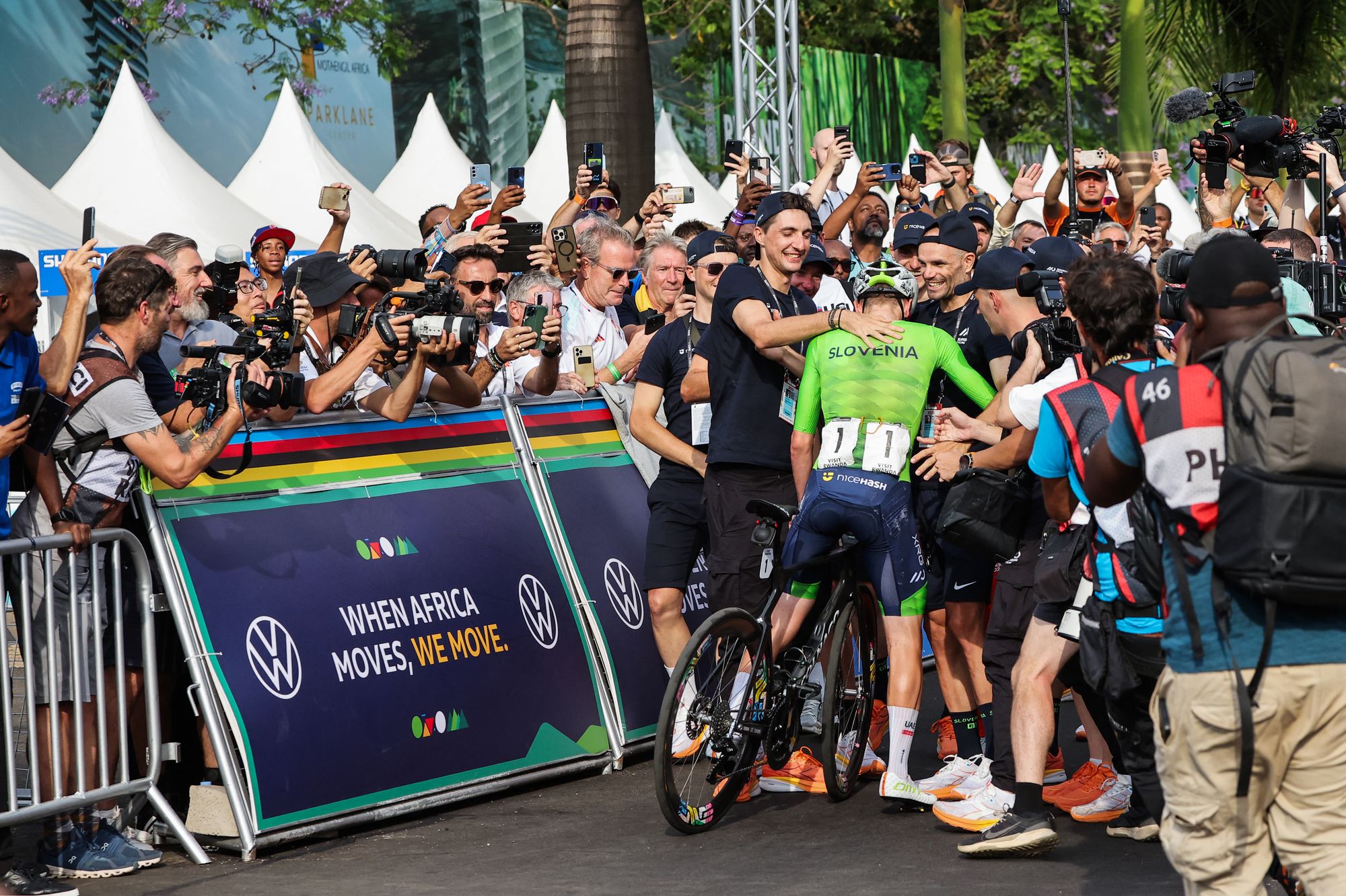 Pogacar was surrounded by his teammates and staff afterwards and celebrated with girlfriend and fellow professional cyclist Urska Zigart