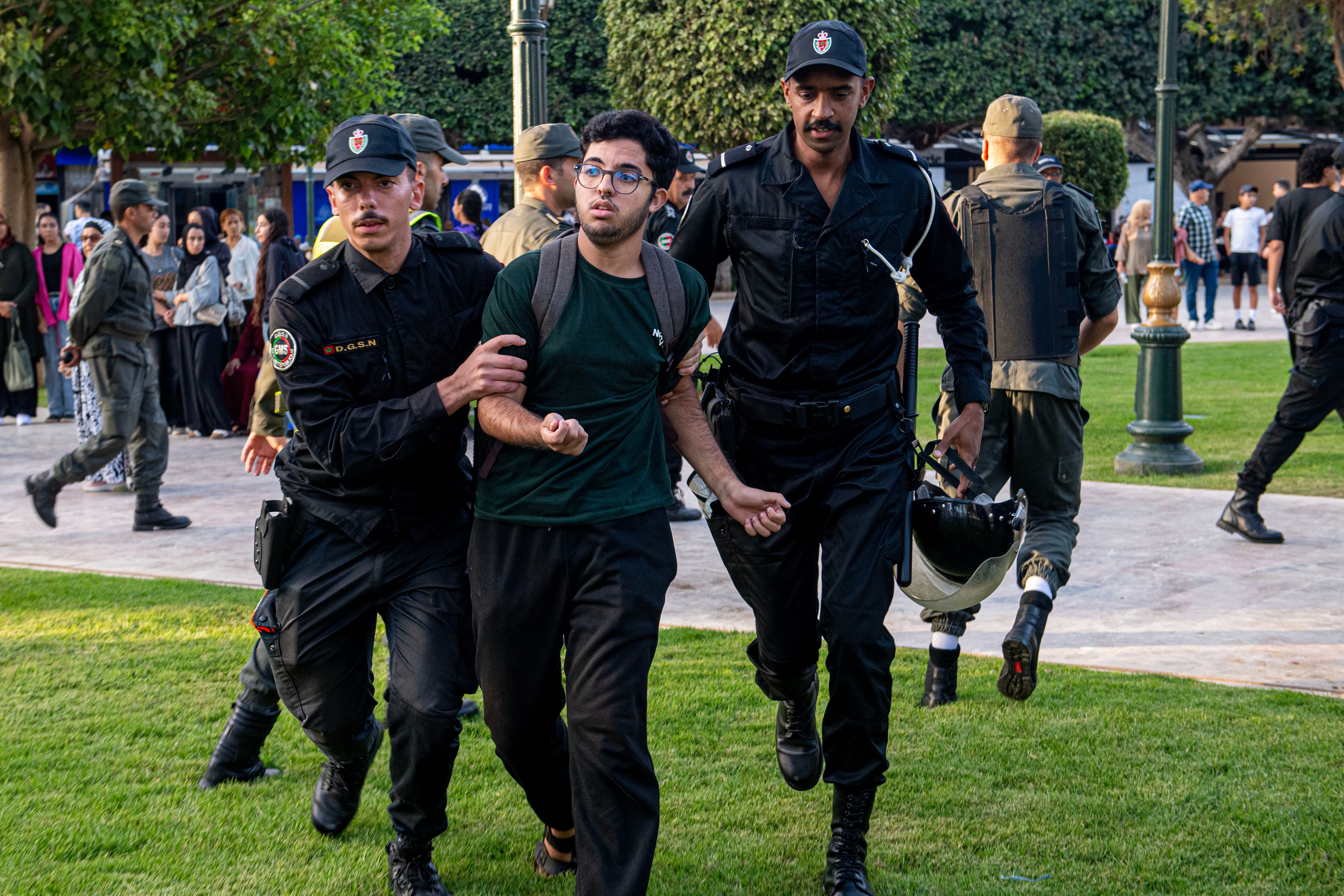 Security forces disperse and arrest protesters during a demonstration demanding healthcare and education reforms, in Rabat, Morocco, on Saturday, Sept. 27, 2025. (AP Photo)