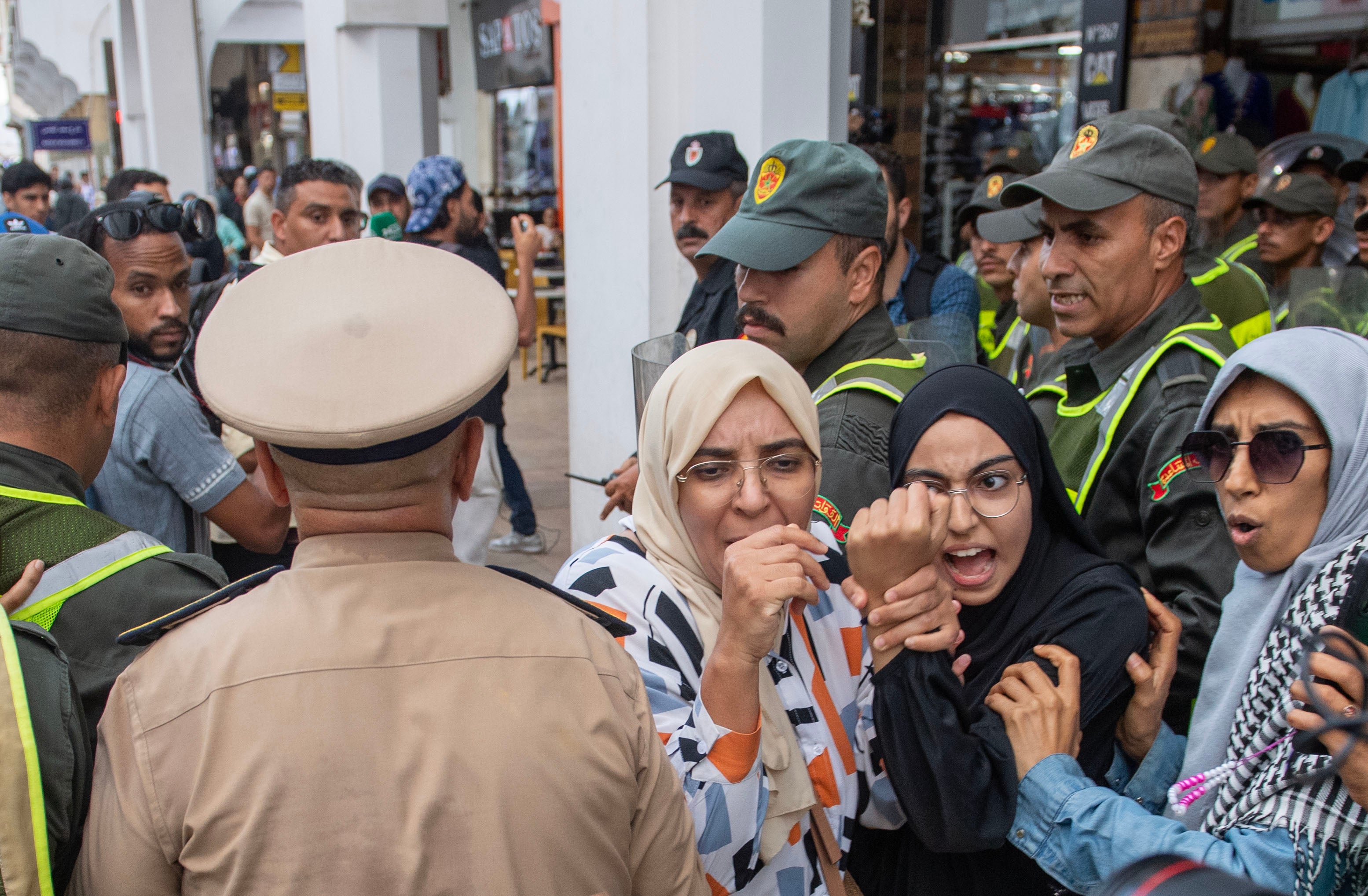Security forces disperse and arrest protesters during a demonstration demanding healthcare and education reforms, in Rabat, Morocco, on Saturday, Sept. 27, 2025. (AP Photo)