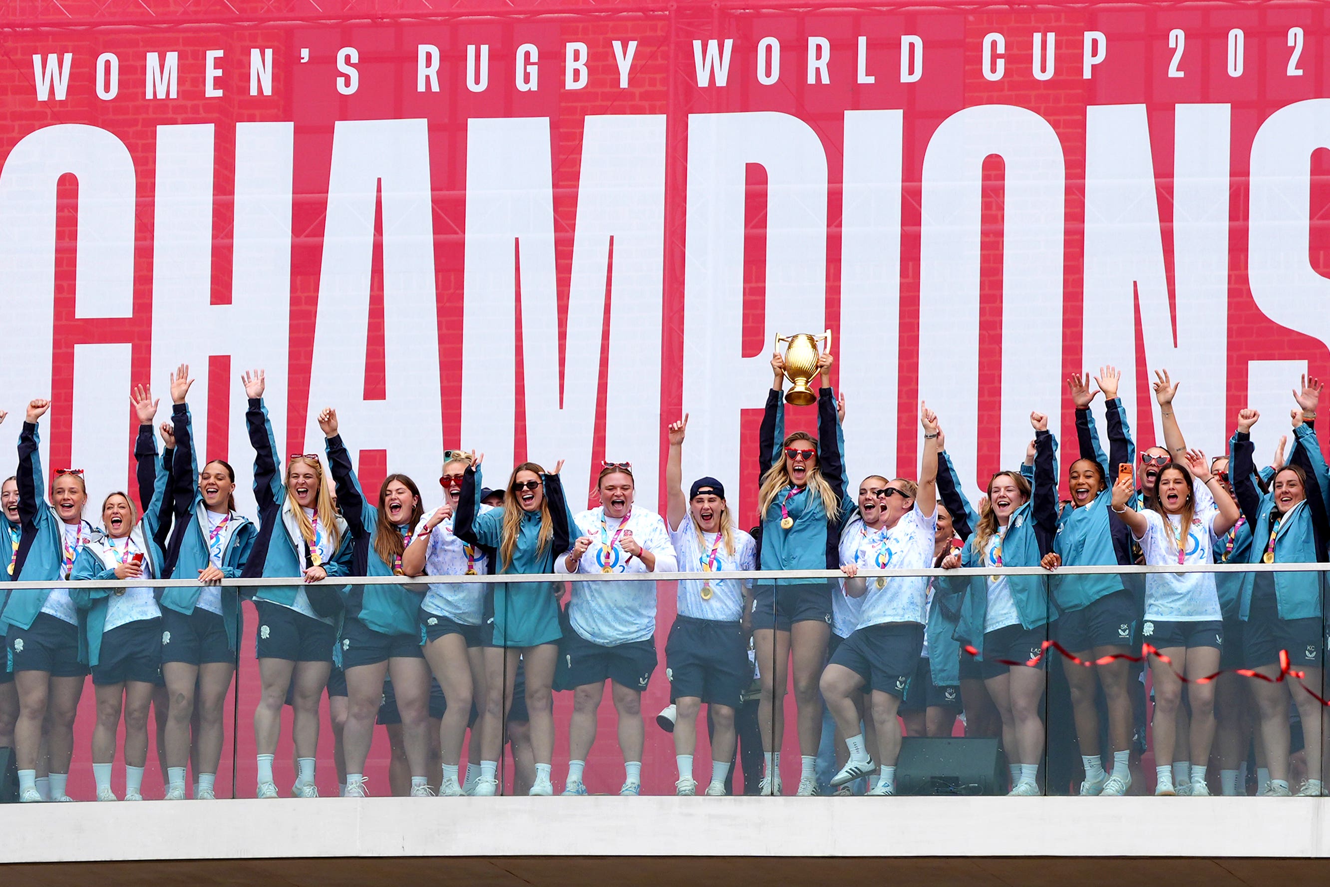 The England team lifted the trophy in front of hundreds of fans at Battersea Power Station (Ben Whitley/PA)