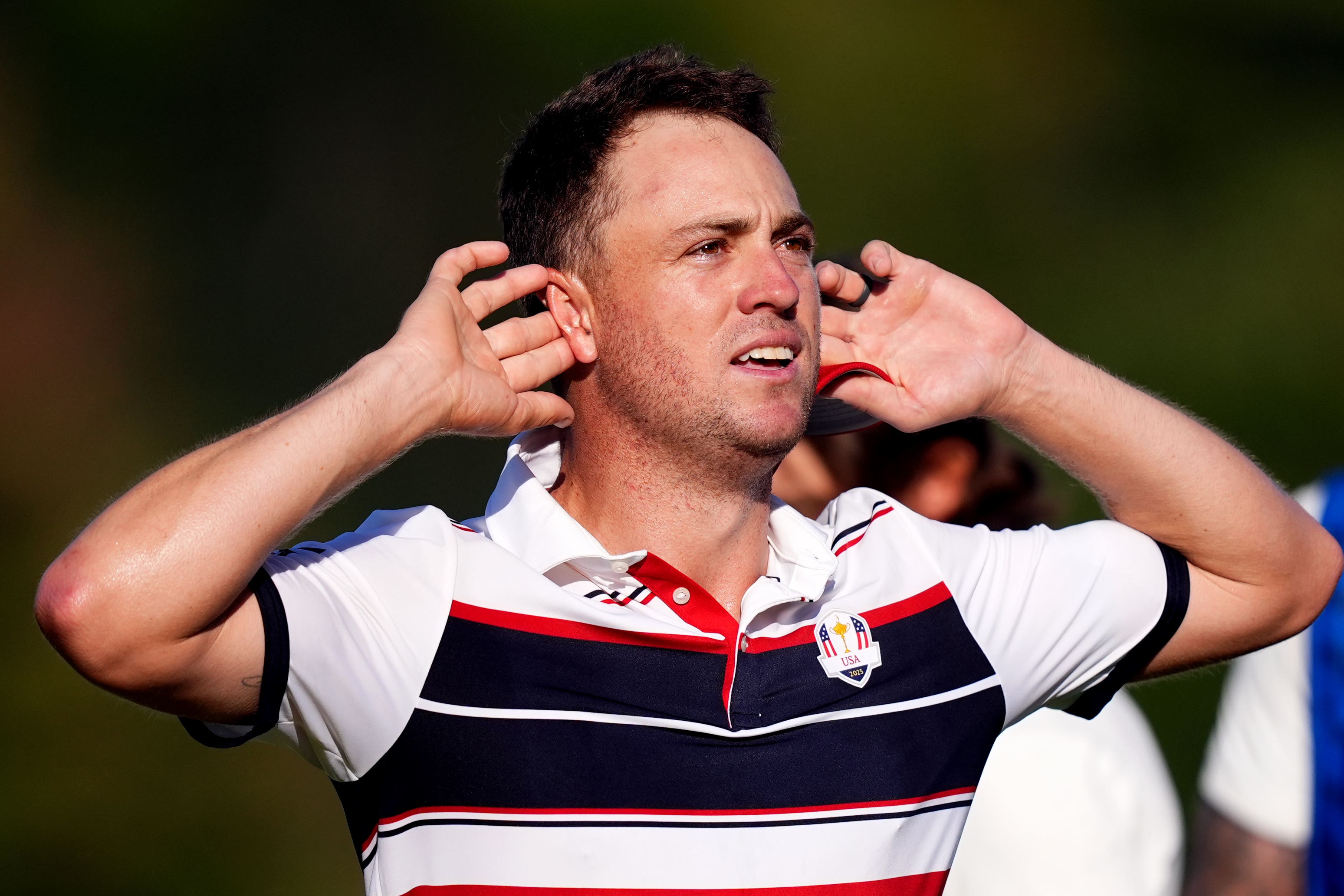 Justin Thomas celebrates winning his Sunday singles match against Tommy Fleetwood (Mike Egerton/PA)