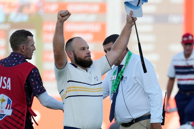 Europe’s Tyrrell Hatton celebrates on the 18th hole (Seth Wenig/AP)