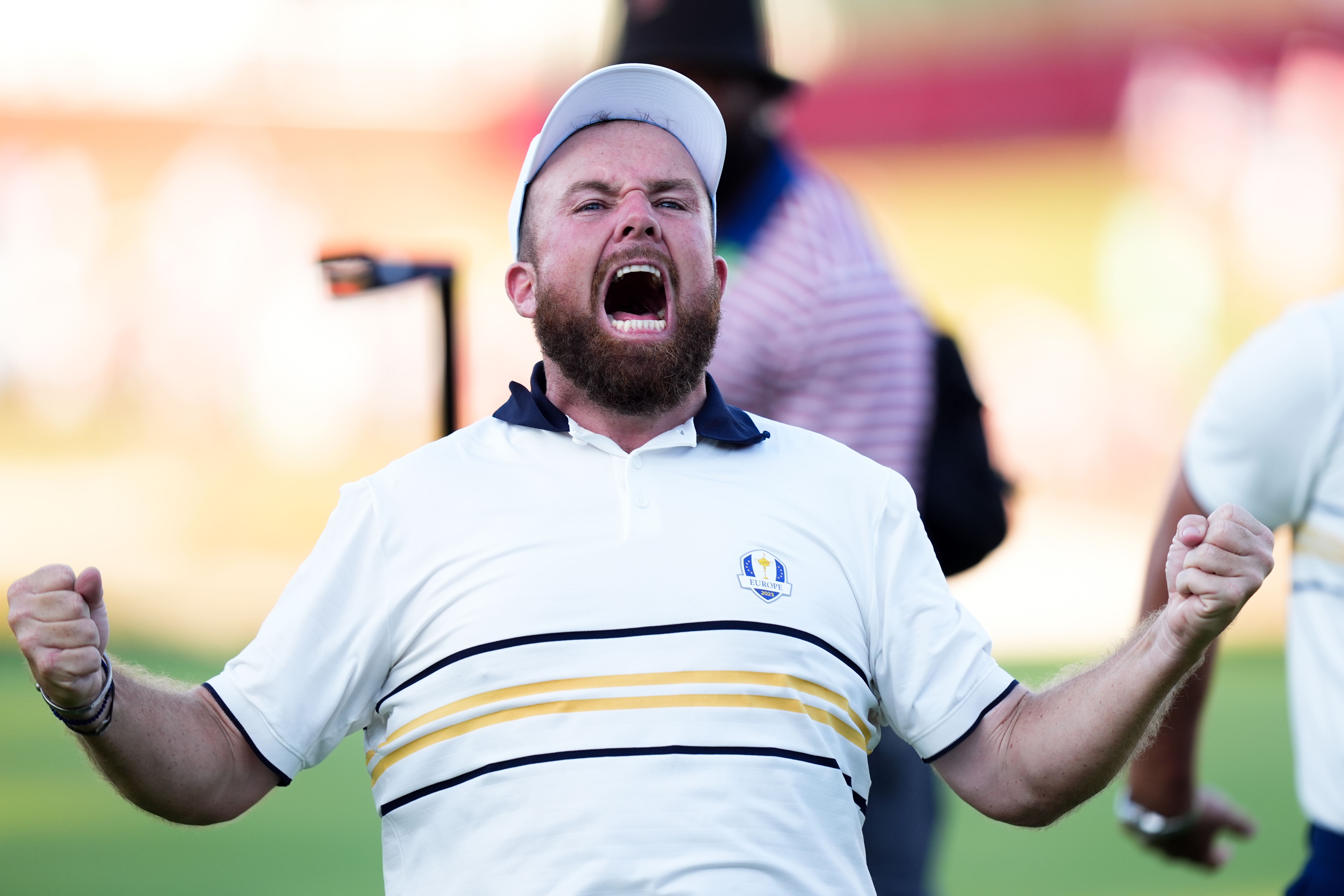 Shane Lowry celebrates a putt on the 18th green to retain the Ryder Cup for Team Europe (Mike Egerton/PA)