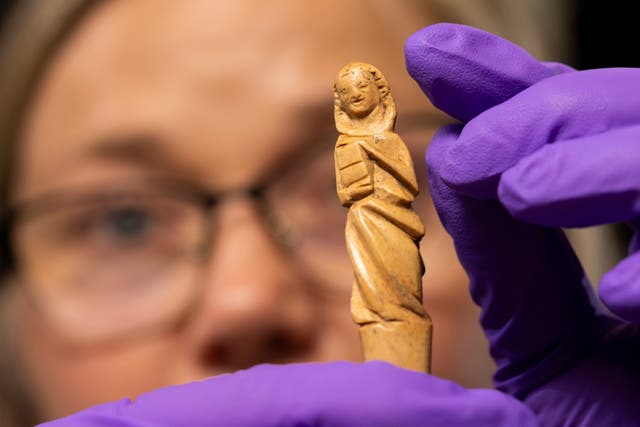 <p>Dr Alice Blackwell with the gravoir. (Duncan McGlynn/PA)</p>