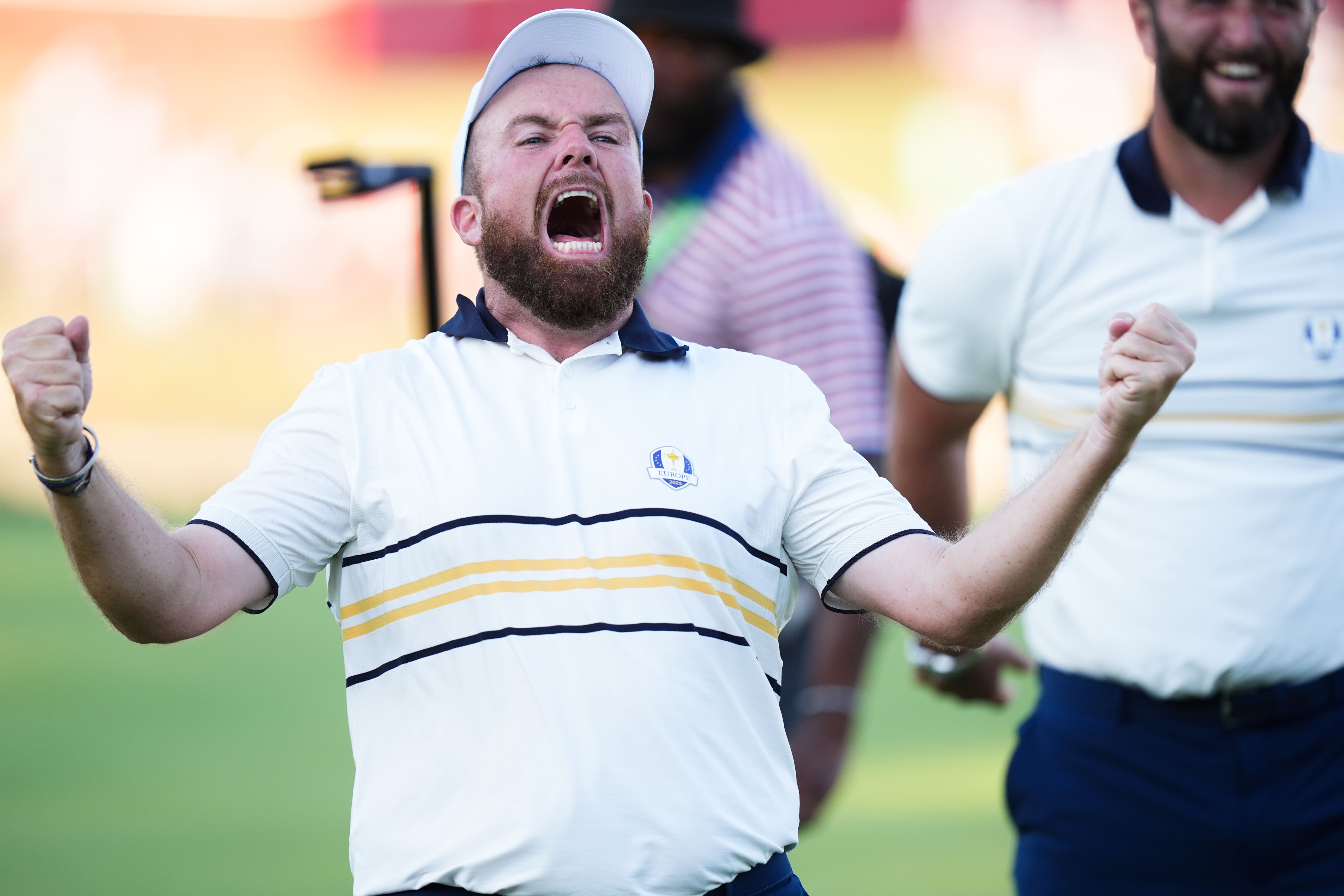 Shane Lowry celebrates his putt on the 18th green to retain the Ryder Cup for Europe (Mike Egerton/PA)