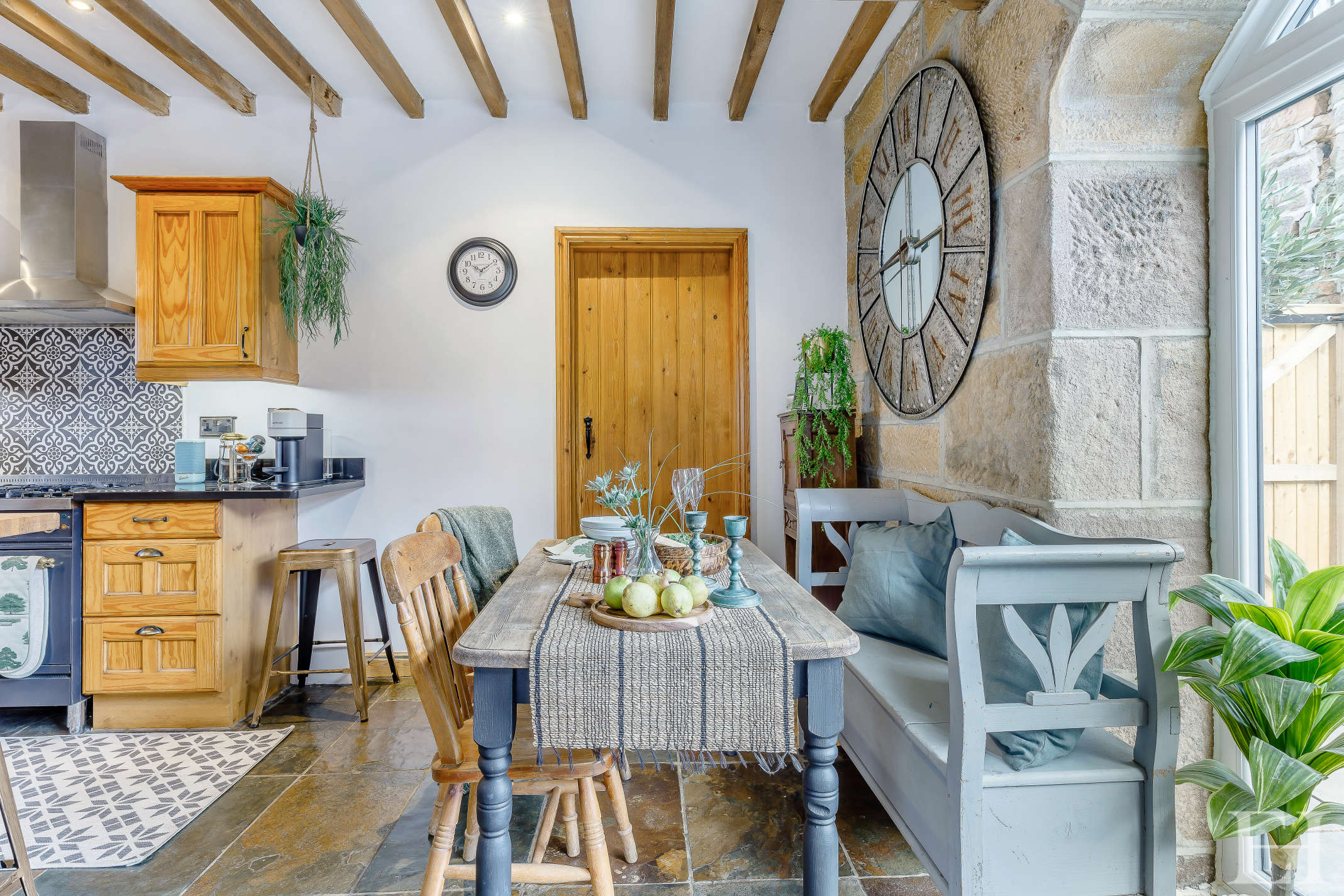 Host dinner in the wood-beamed kitchen at The Old Carthouse