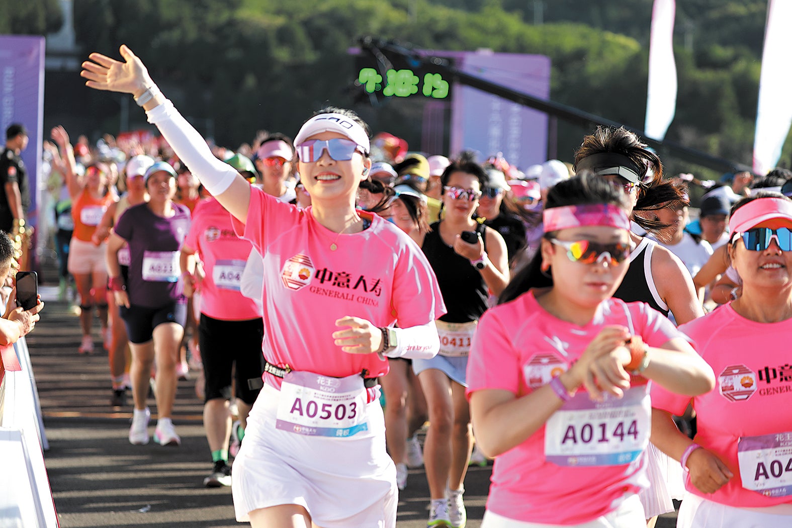 Run Girls, a special running event for women, kicks off along the scenic Ming Tombs Reservoir in Changping district in Beijing