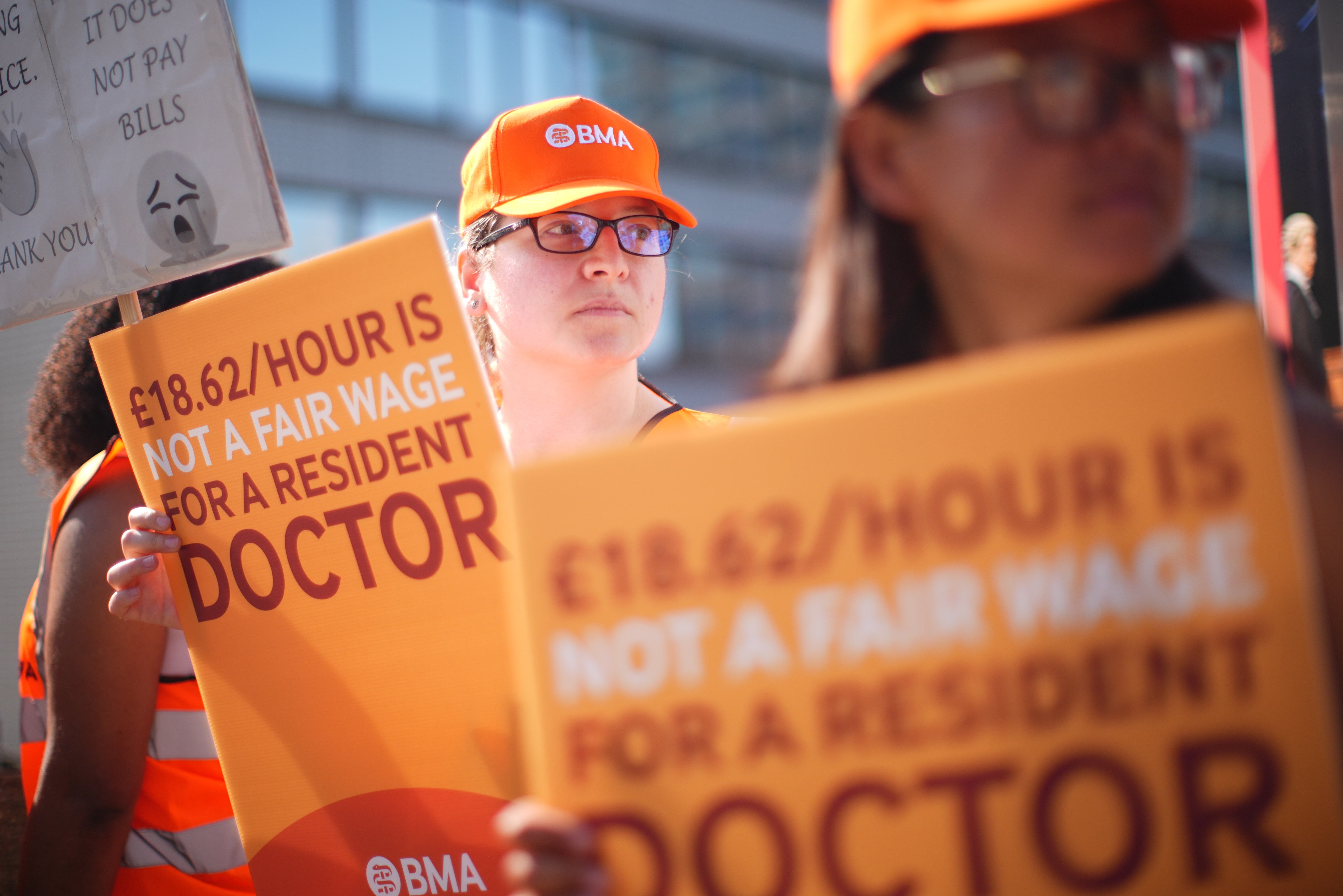 NHS resident doctors and supporters outside St Thomas’ Hospital in London during July’s strike