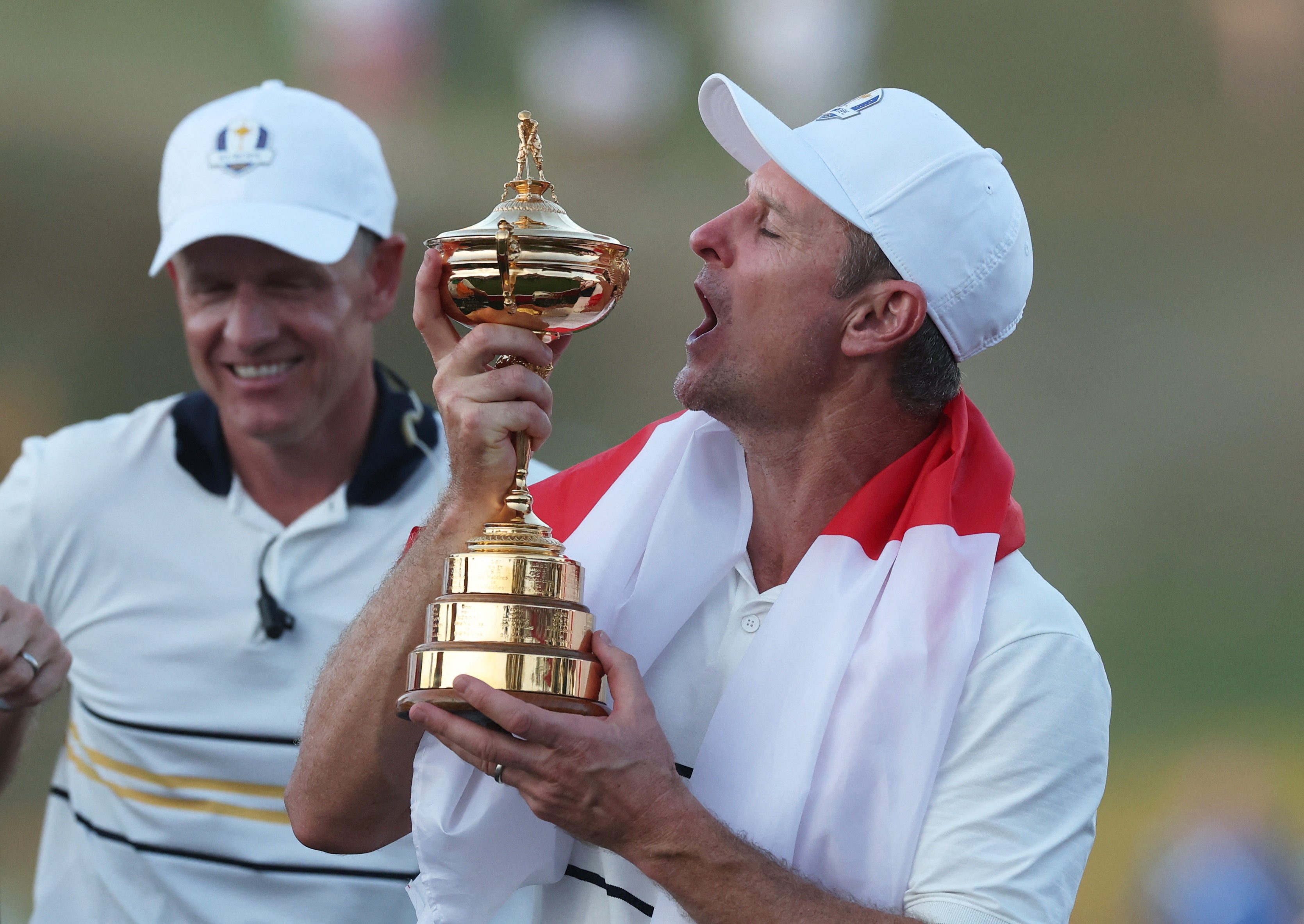 Justin Rose celebrated winning another Ryder Cup, with Luke Donald watching on