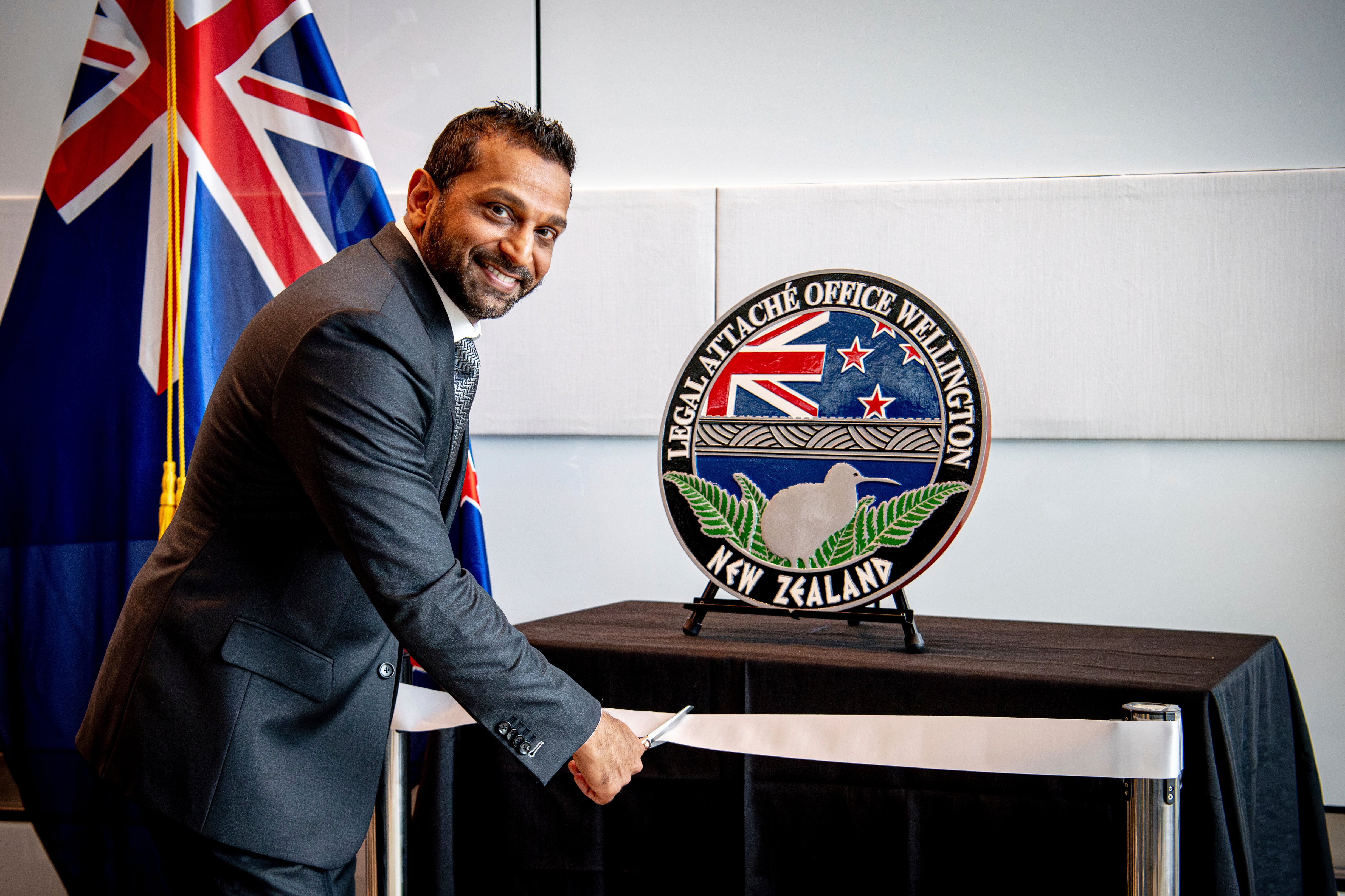 FBI Director Kash Patel cuts the ribbon at the official opening of the FBI office in Wellington, New Zealand