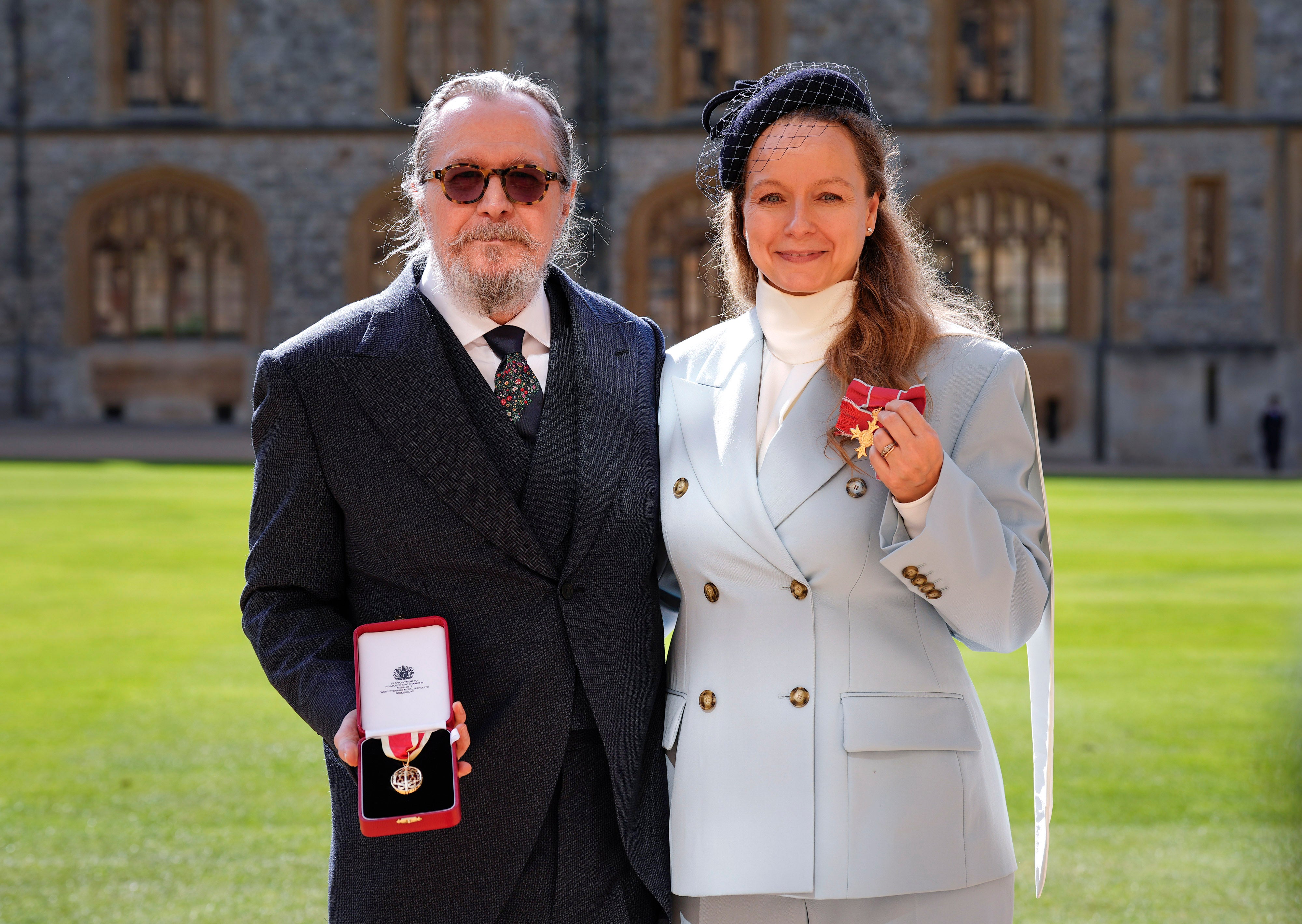 Sir Gary Oldman after he was made a Knight Bachelor and Dr. Samantha Morton after she was made an Officer of the Order of the British Empire at a ceremony at Windsor Castle, Berkshire