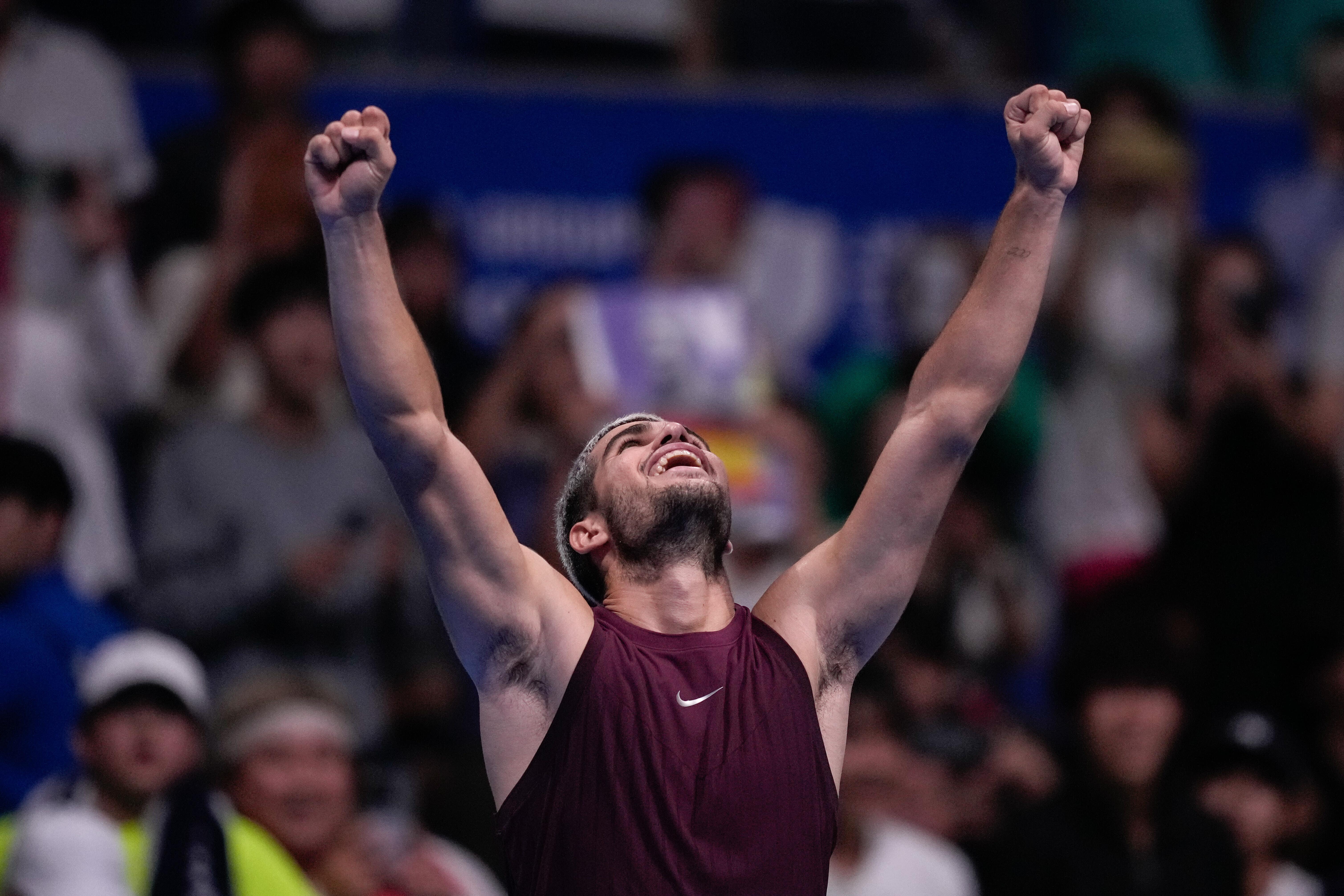 Carlos Alcaraz celebrates beating Taylor Fritz (Louise Delmotte/AP)