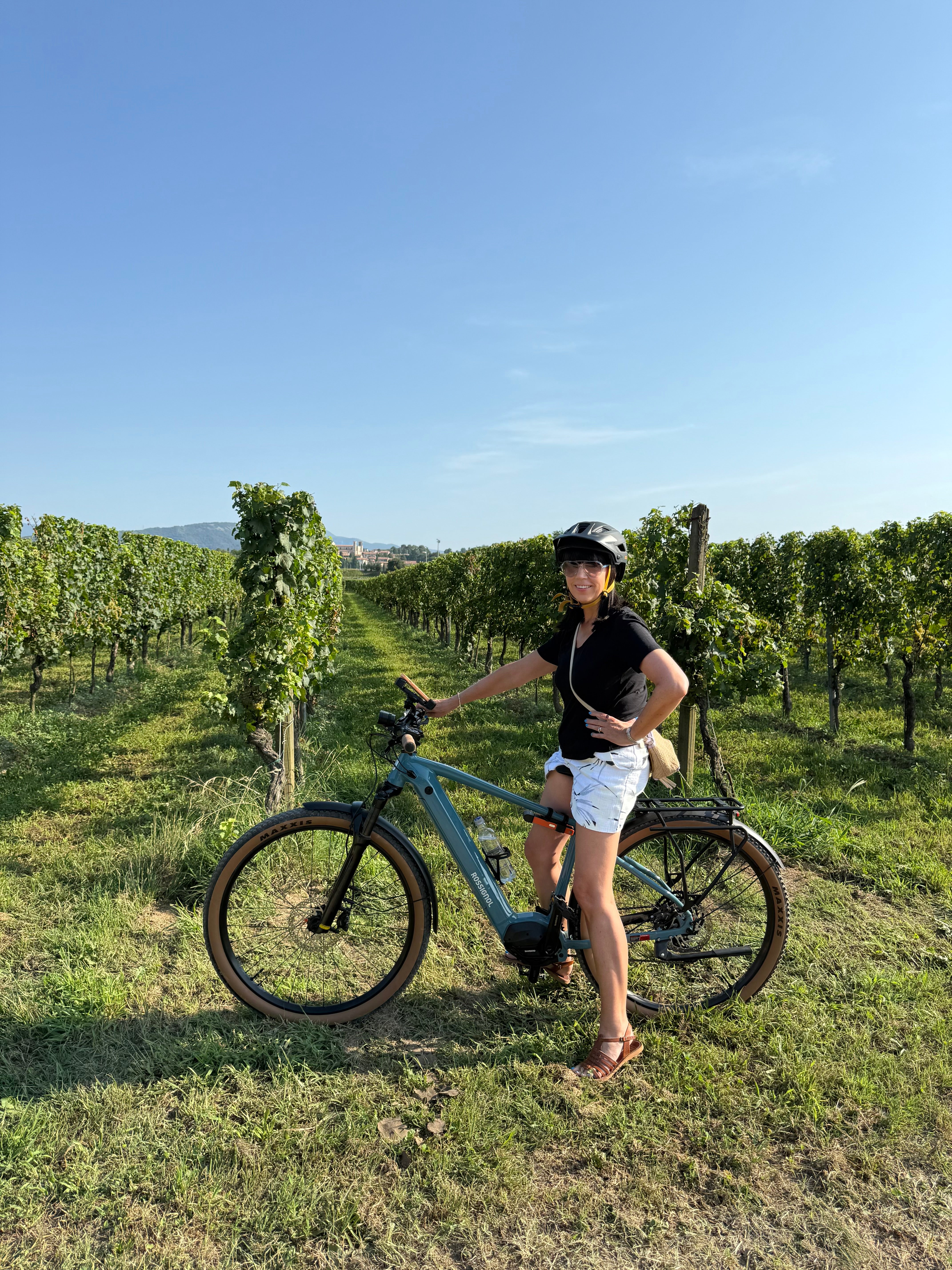 Kate explores the rolling vineyards of the Bellavista Winery by e-bike