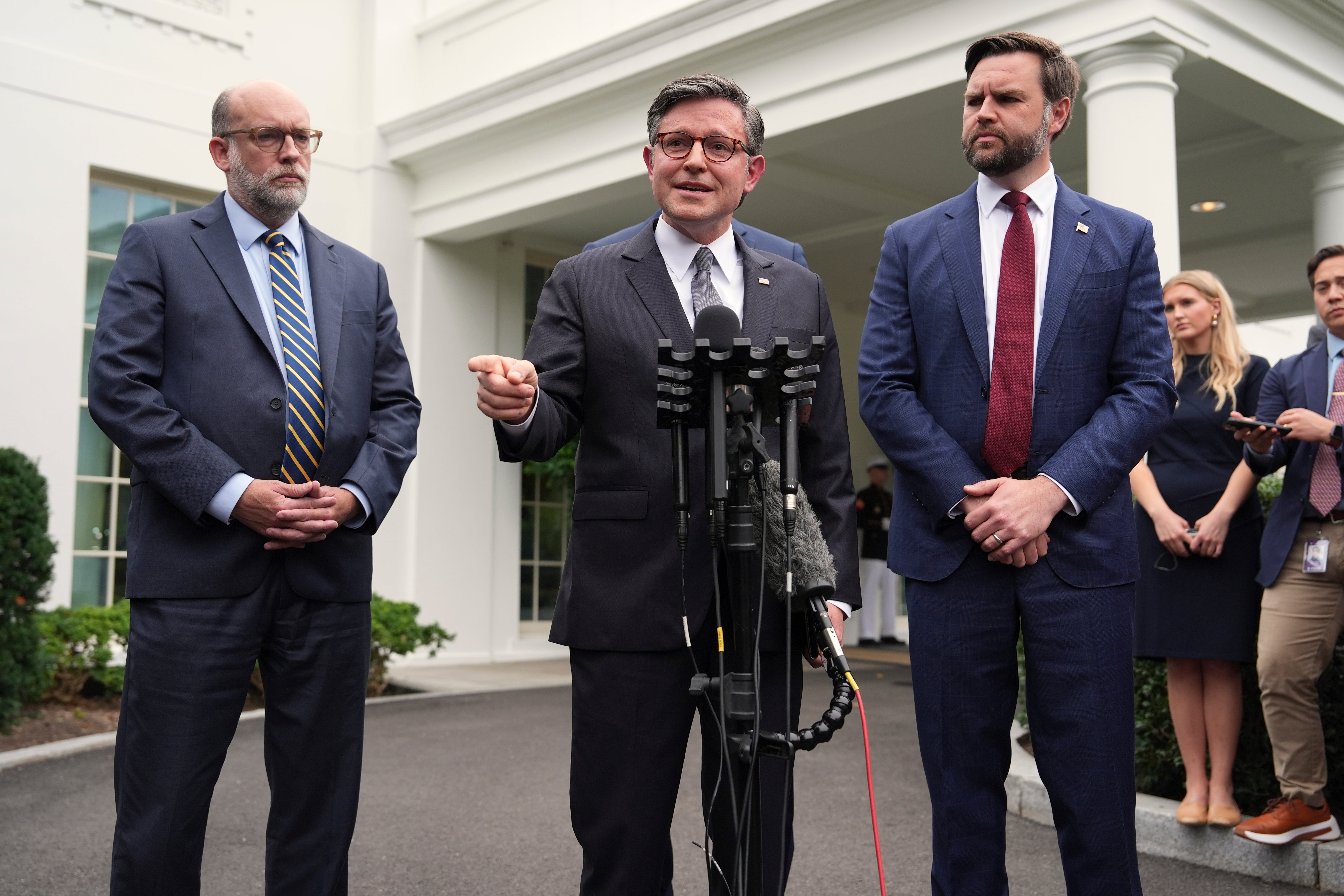House Speaker Mike Johnson, R-La., speaks alongside Russell Vought, Office of Management and Budget director, left, and Vice President JD Vance speak to reporters after talks broke down with Democratic leaders Hakeem Jeffries and Chuck Schumer on Monday.