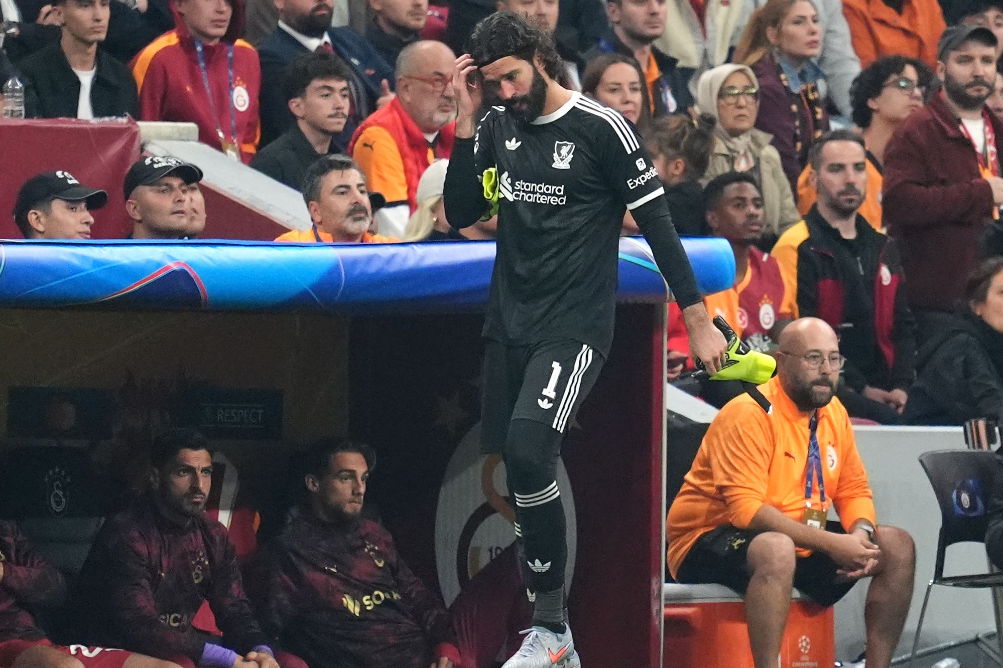 Liverpool goalkeeper Alisson Becker looks on after being substituted off for a possible injury during the UEFA Champions League, league stage match at RAMS Park in Istanbul, Turkey. Picture date: Tuesday September 30, 2025.