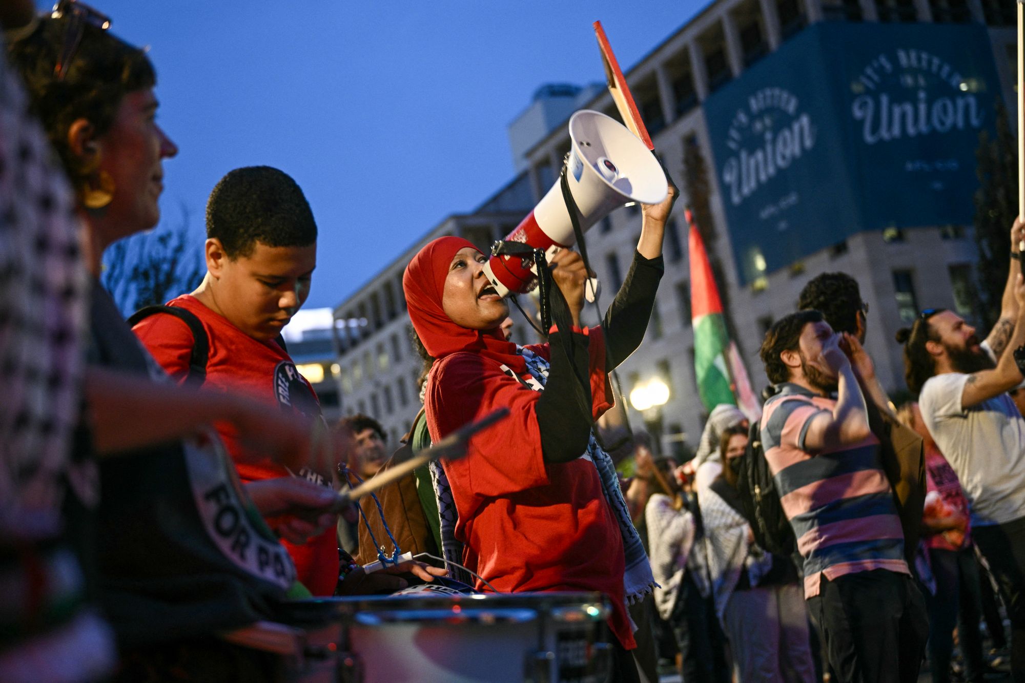 Protesters shout slogans against the visit Monday to the US of Israel Prime Minister Benjamin Netanyahu at Lafayette Square in Washington, DC