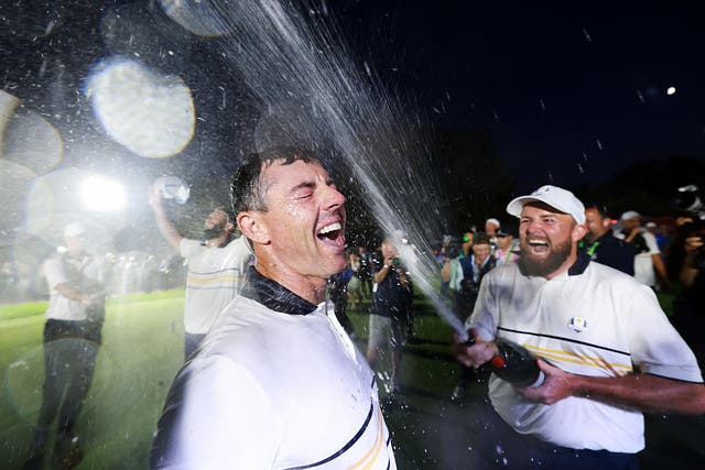 <p>Rory McIlroy is sprayed with champagne following Europe’s Ryder Cup victory in New York</p>