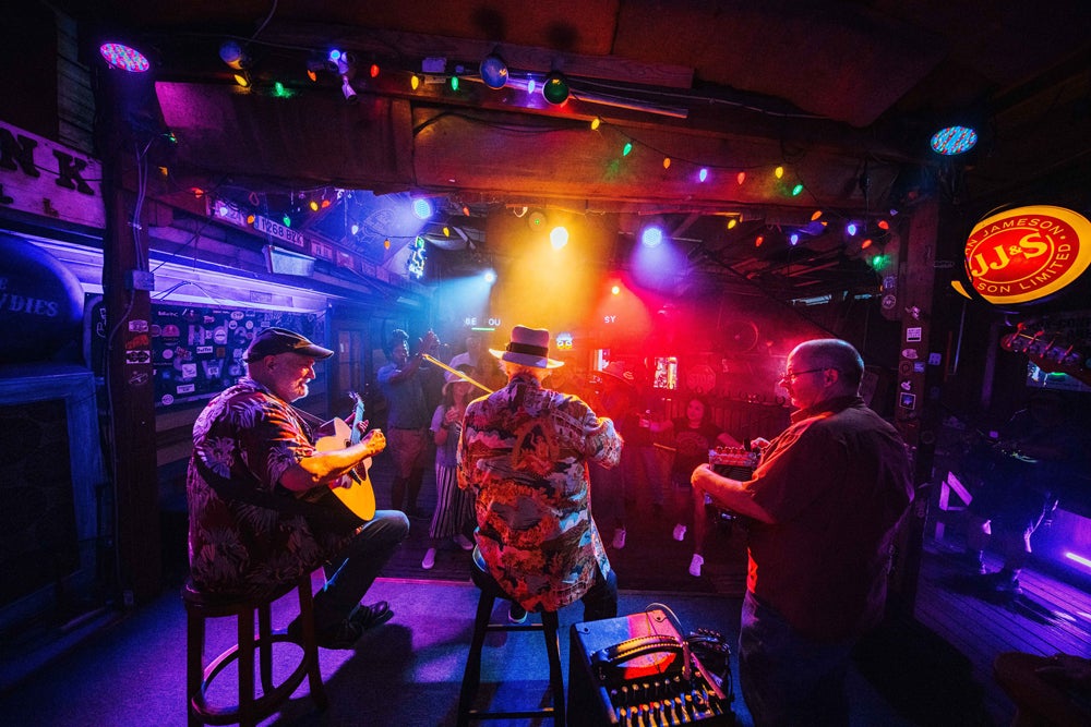 Lose yourself in the high-energy zydeco and Cajun jams hosted at the charming Blue Moon Saloon