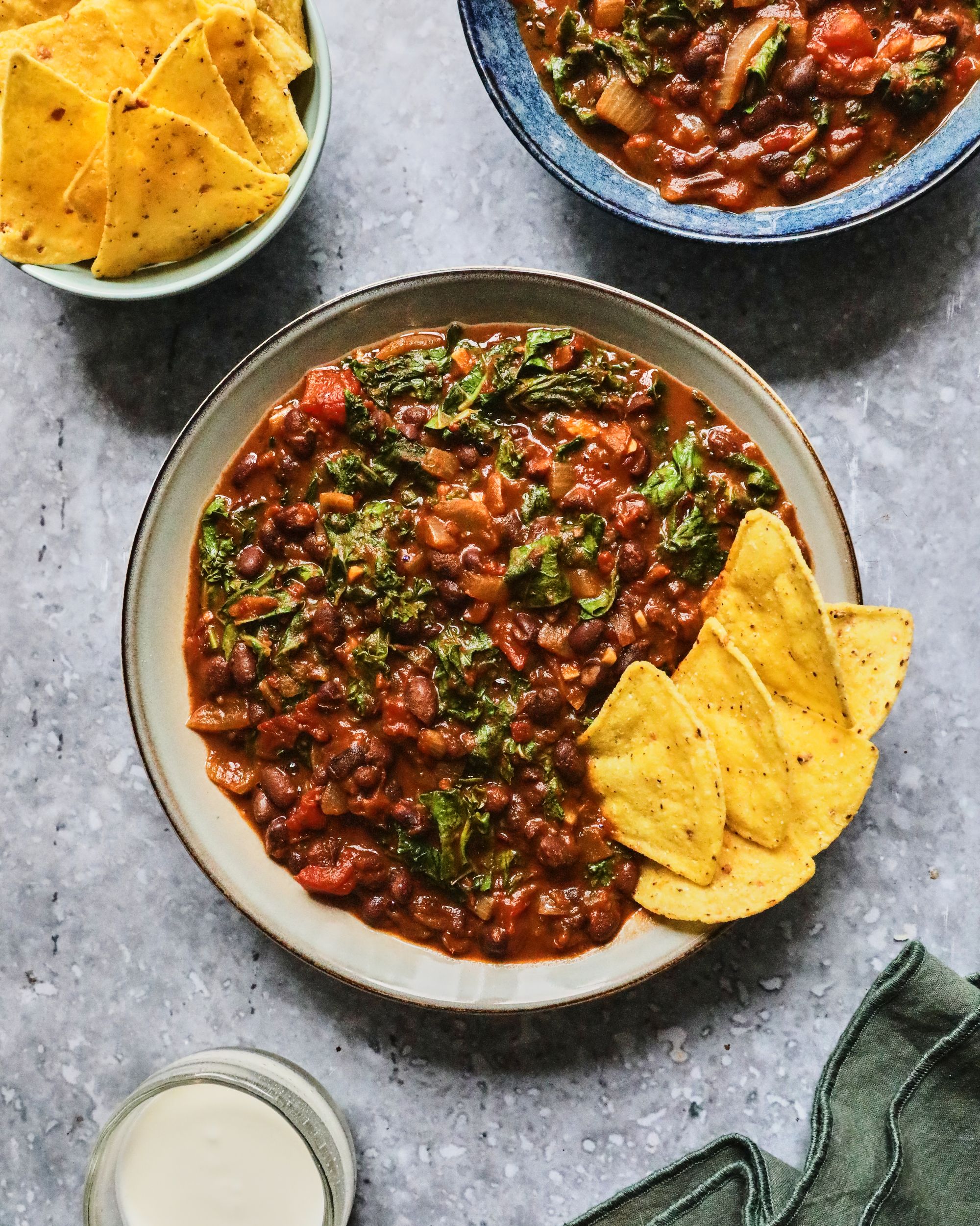 Spicy, smoky and finished with crunchy tortilla chips – proof that comfort food can still pack in the greens