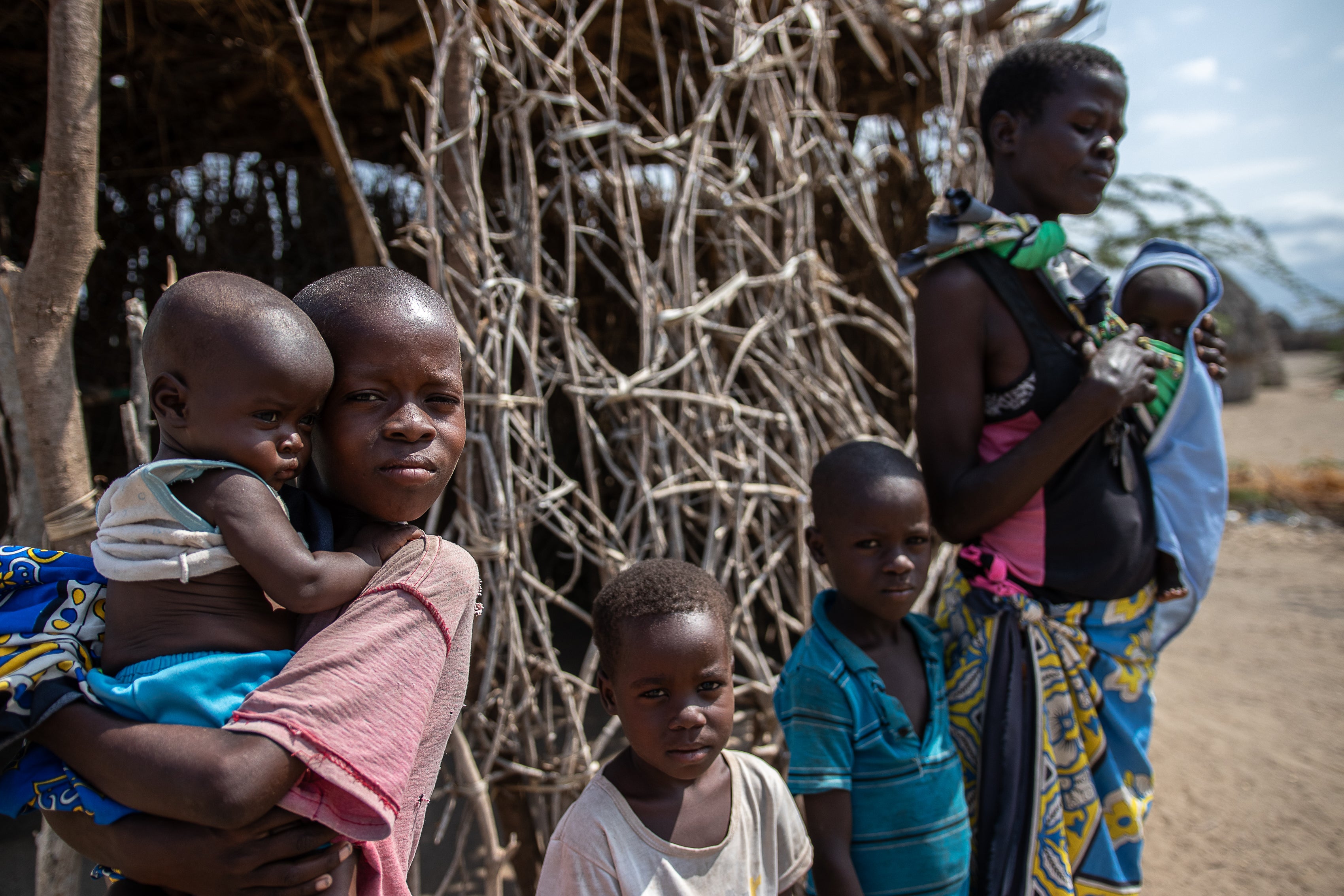 Dinah, pictured here with her family, says that NGOs like the World Food Programme who used to support the family in Turkana are no longer coming