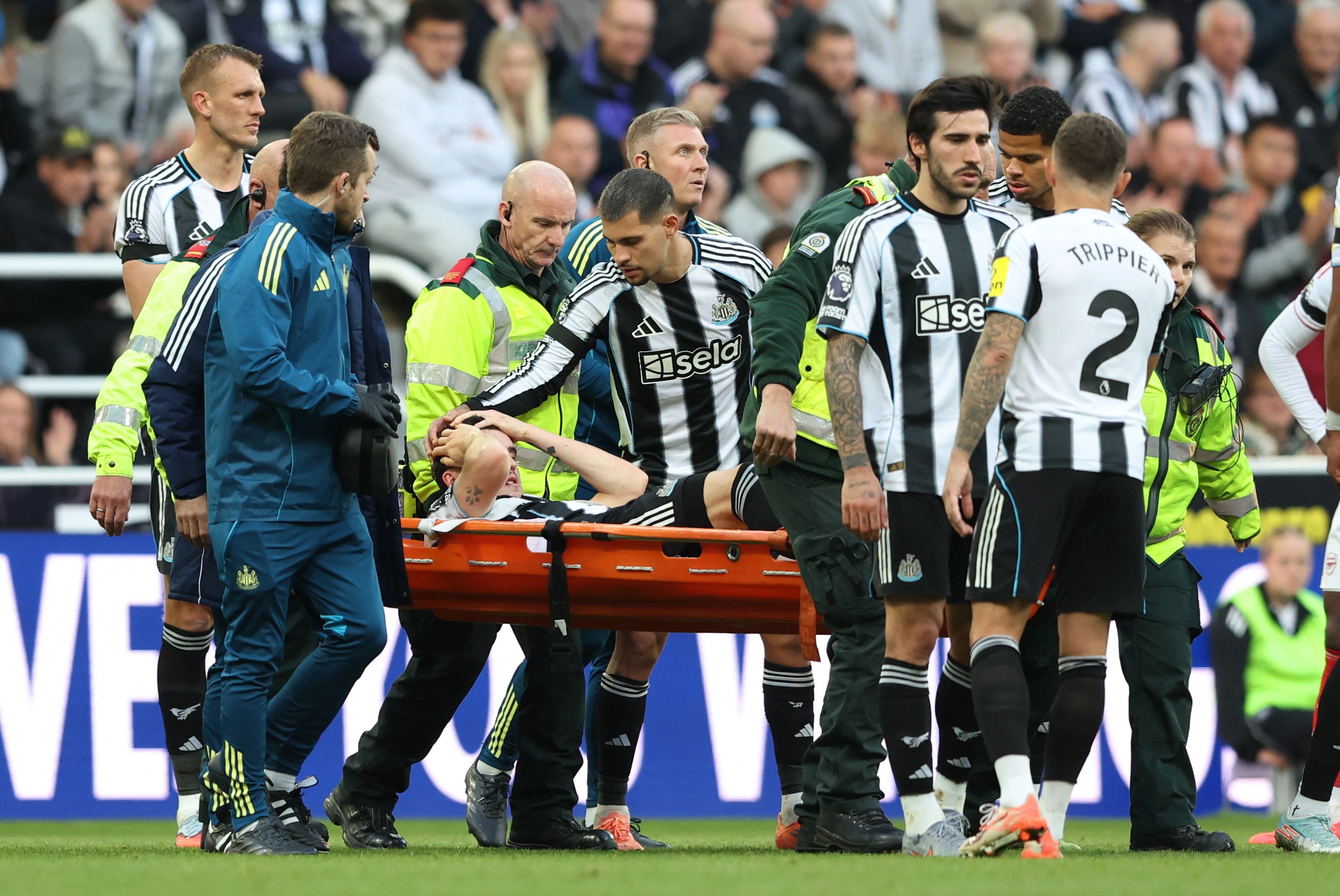 Tino Livramento was brought off the field in Newcastle's defeat by Arsenal