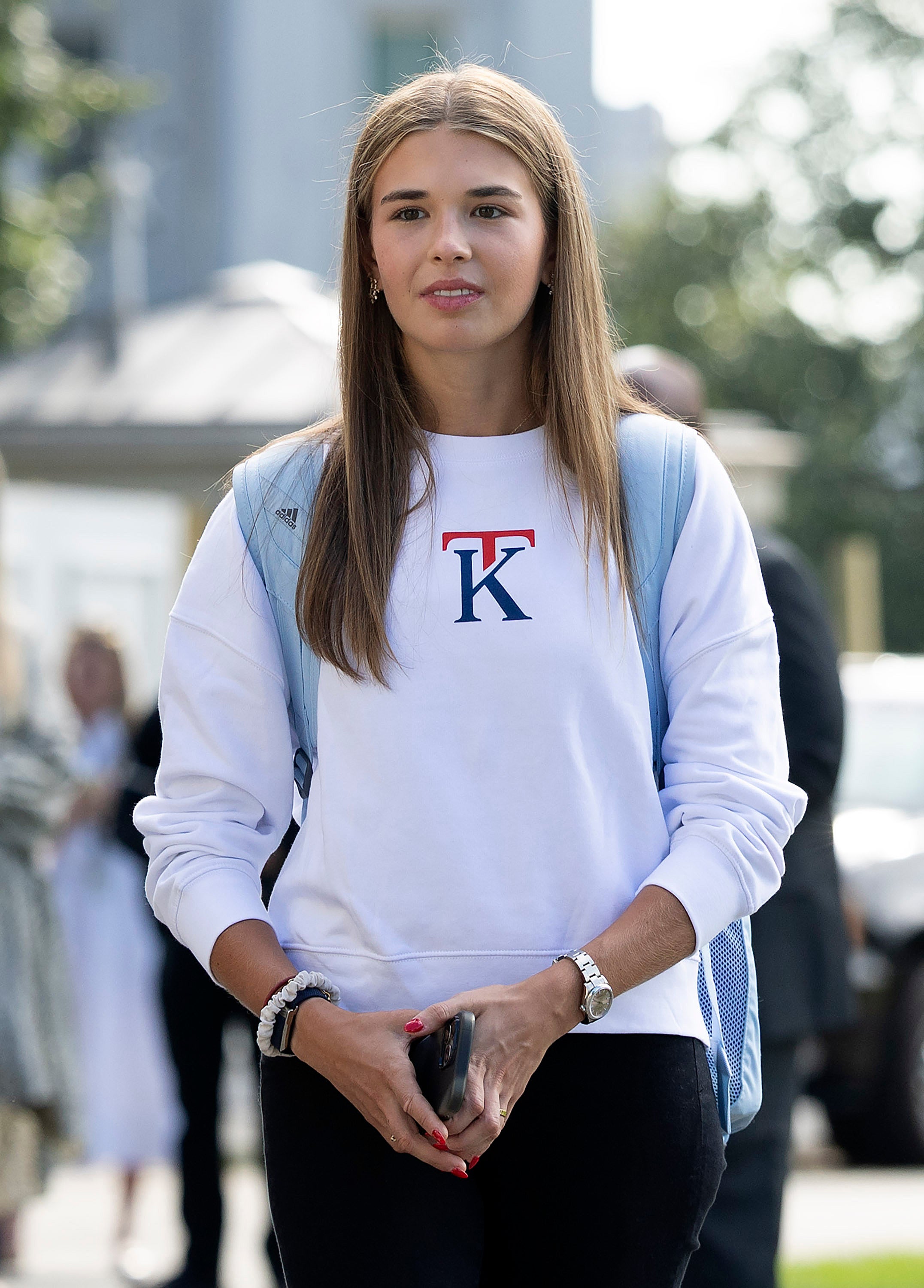 Kai Trump, U.S. President Donald Trump’s granddaughter, departs the White House sporting a sweater from her new clothing line on Friday ,September 26, 2025