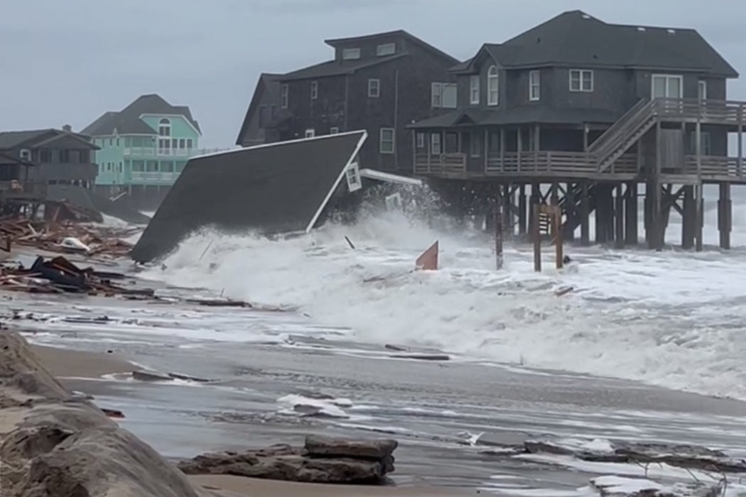 Waves from Hurricanes Humberto and Imelda destroy a home in Buxton, N.C., Tuesday, September 30, 2025