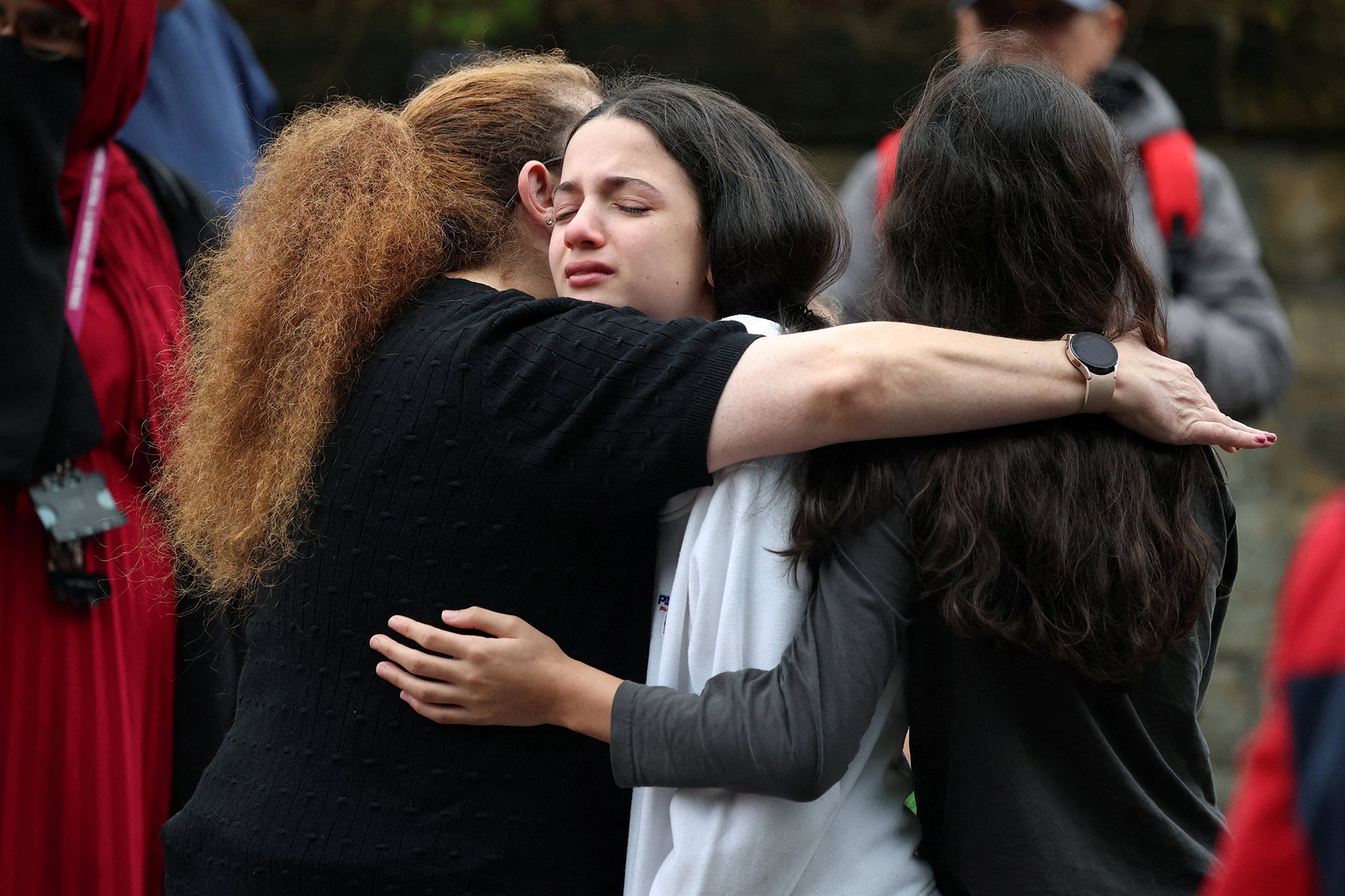 Mourners gathered at the scene on Middleton Road