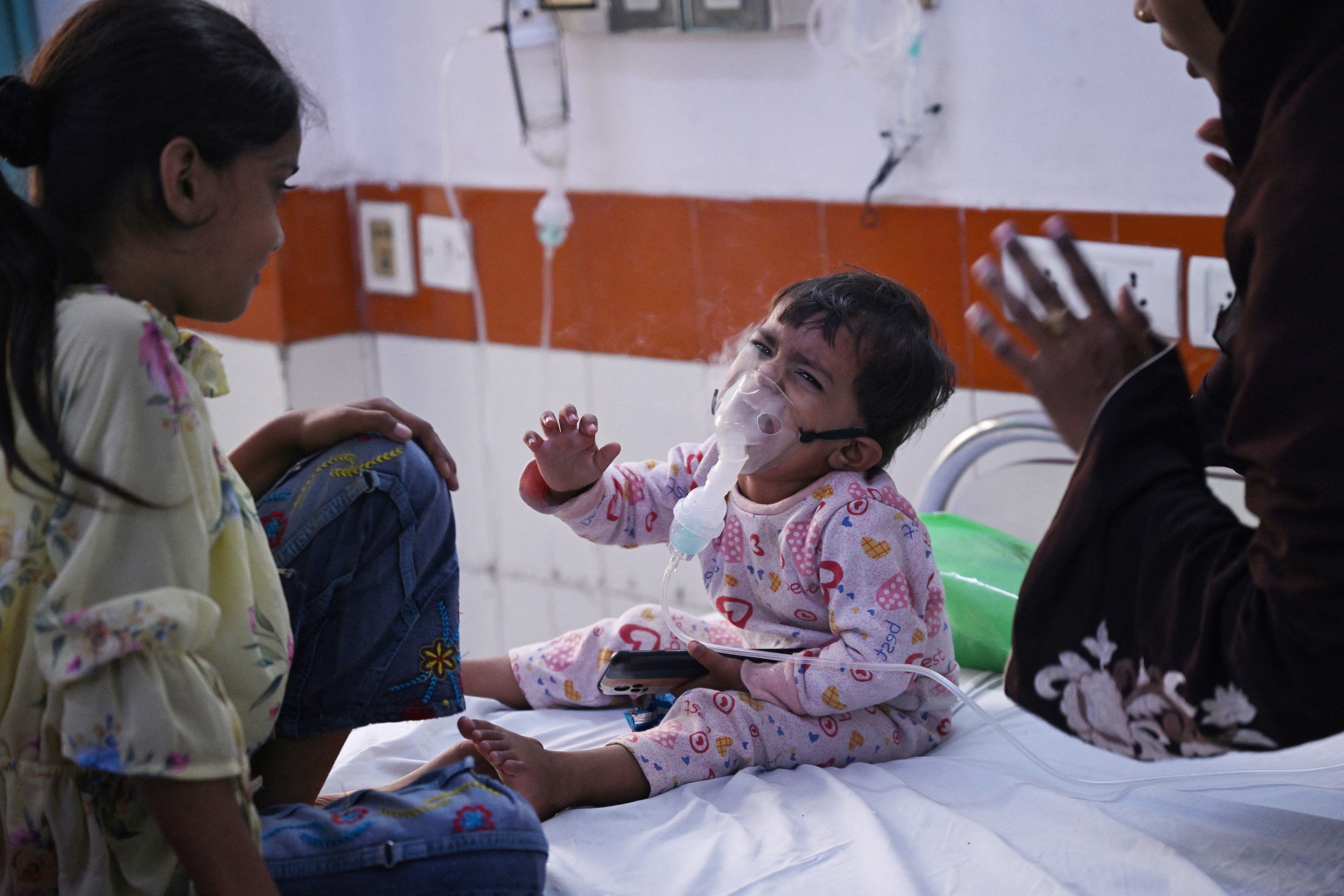 File. A child reacts during treatment in hospital
