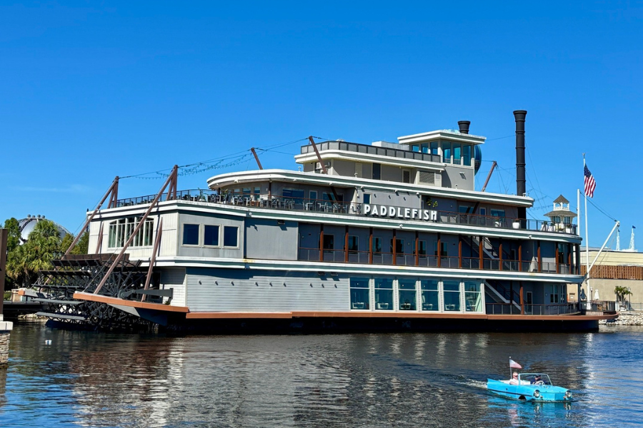 The robbery suspect allegedly swam up to Paddlefish, a replica steamboat, took the money, then swam away