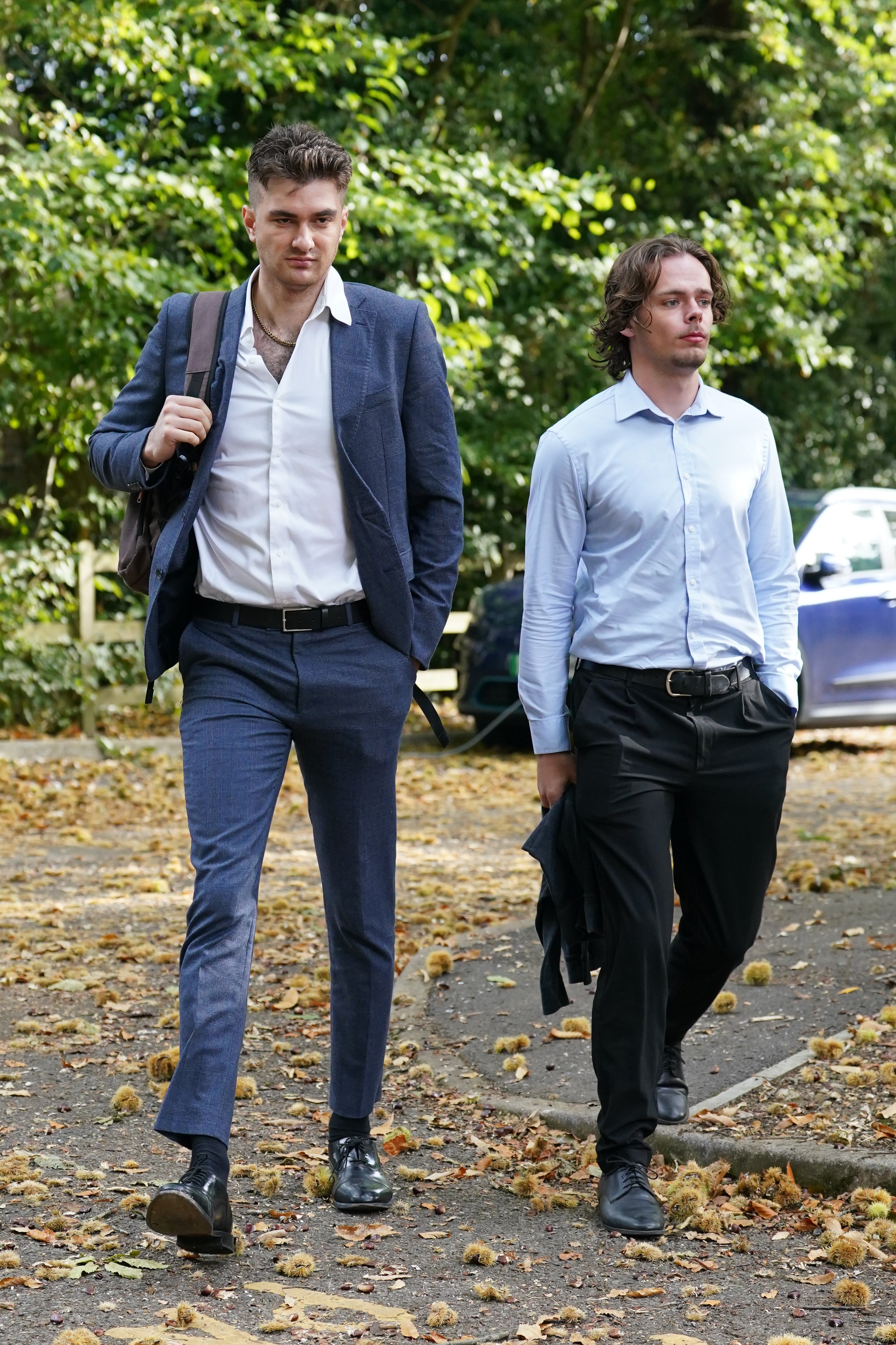Ander Harris arriving with Gabriel Shemirani (left) for the inquest into the death of Paloma Shemirani (Gareth Fuller/PA)