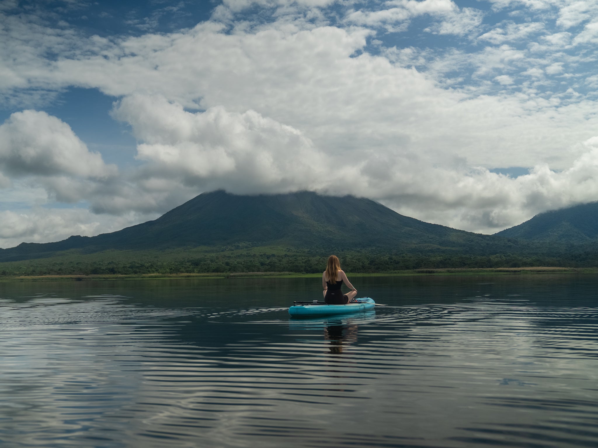 Paddleboarding at Lake Arenal is one of the best ways to experience the water in Costa Rica