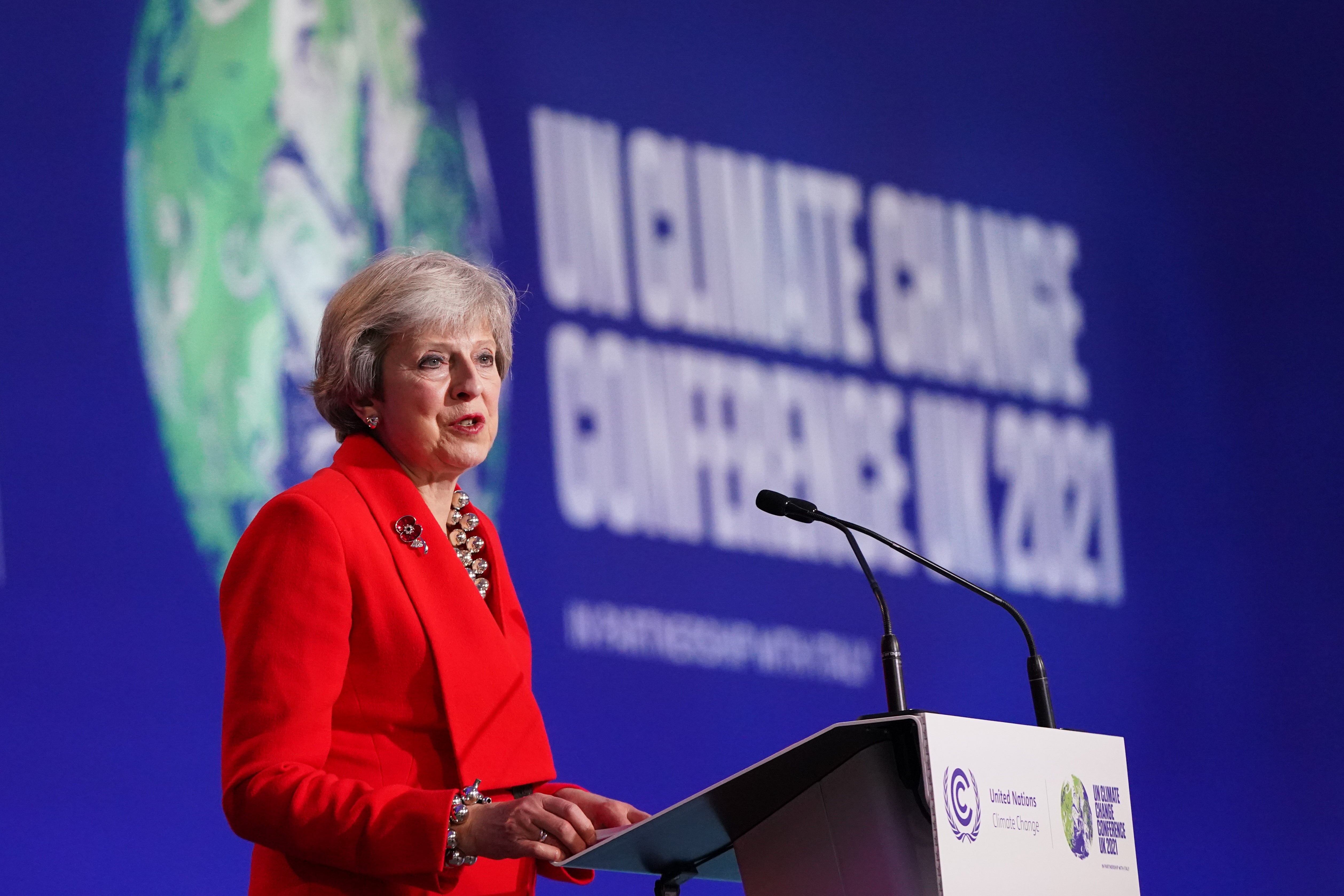 Theresa May making a speech at COP26 in Glasgow in 2021
