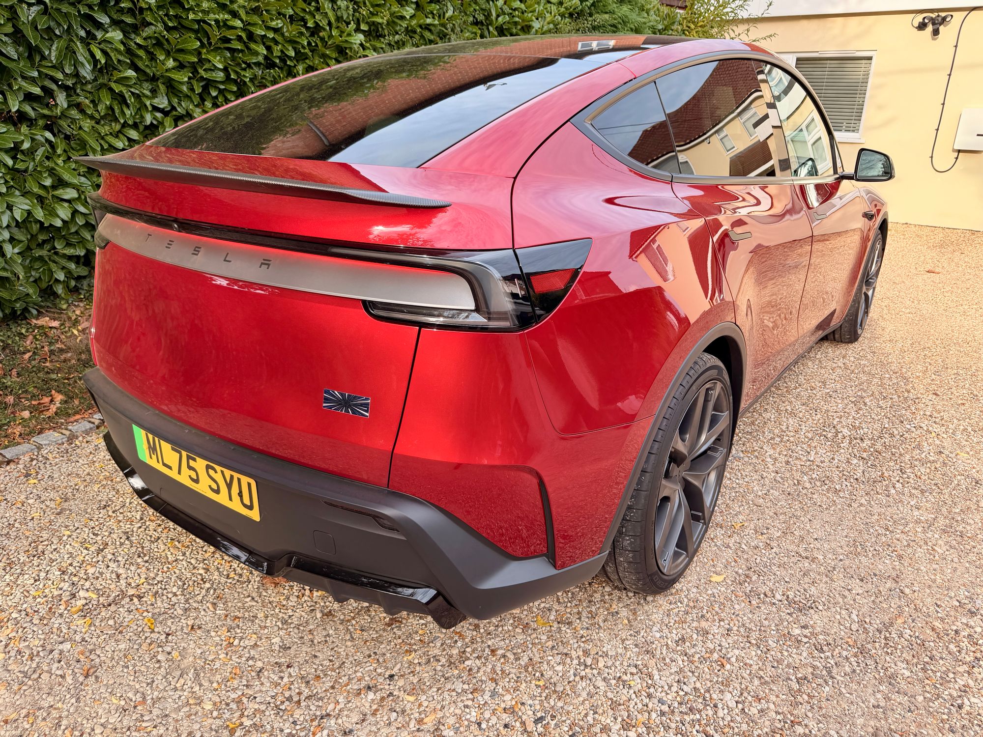 External enhancements to the Tesla Model Y Performance include aerodynamic boosts and Performance badging