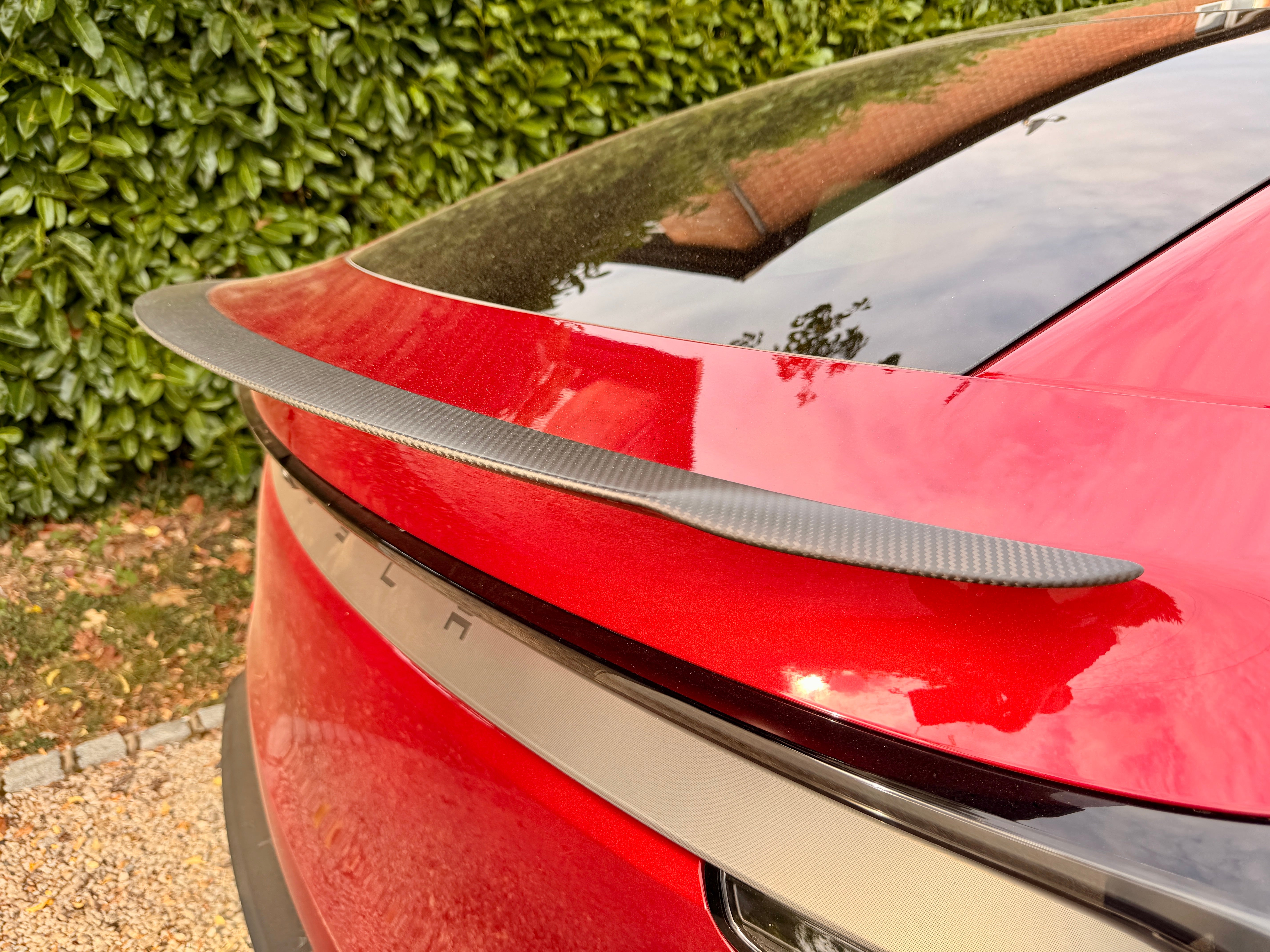 A carbon fibre rear spoiler is one of a host of aerodynamic improvements on the Tesla Model Y Performance