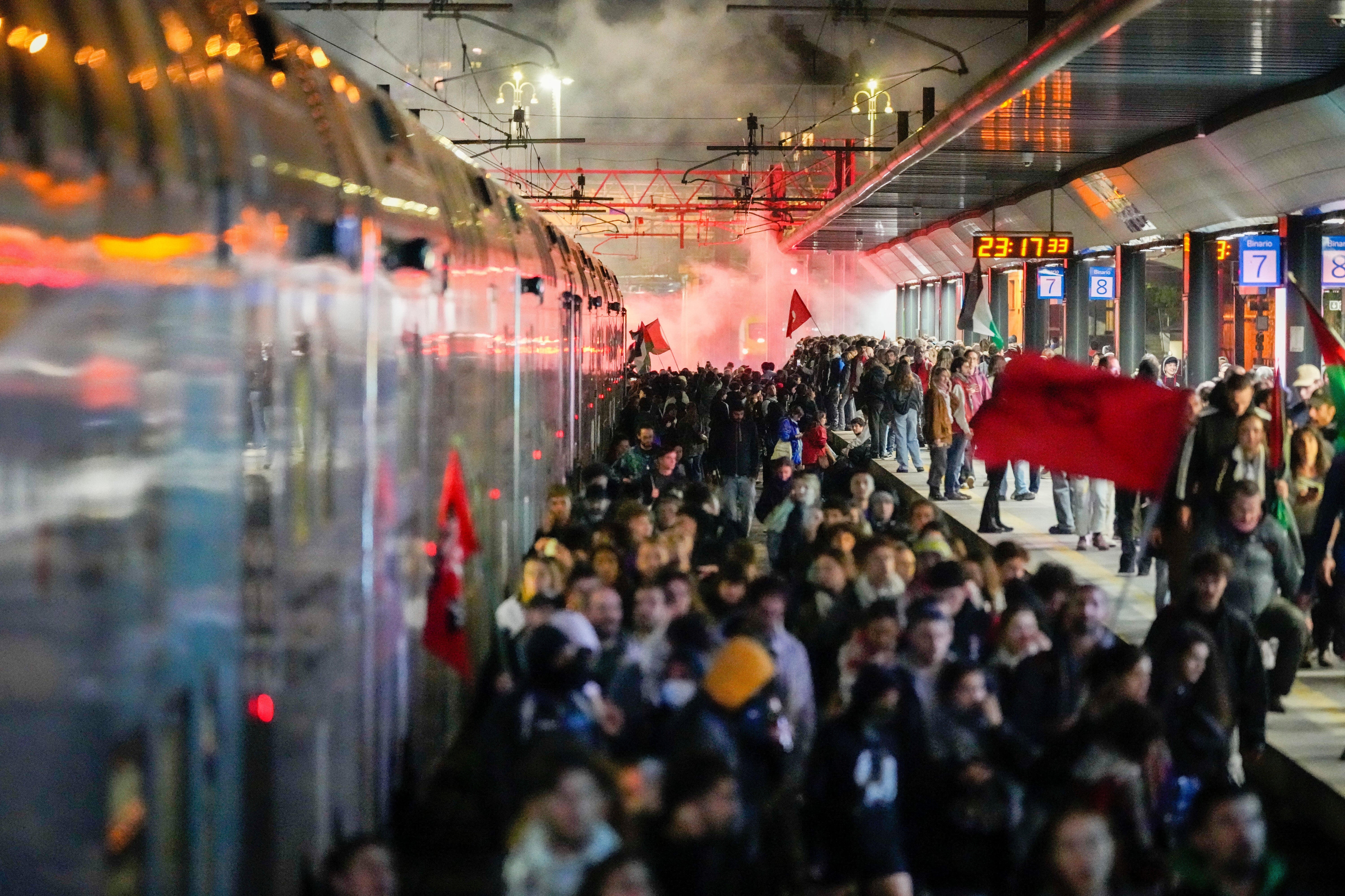 Pro-Palestinian demonstrators flood the rail track at Milan’s Cadorna railway station, Italy, late Wednesday, 1 October 2025, after news that a Gaza-bound aid flotilla had been intercepted by Israeli forces in the Mediterranean Sea