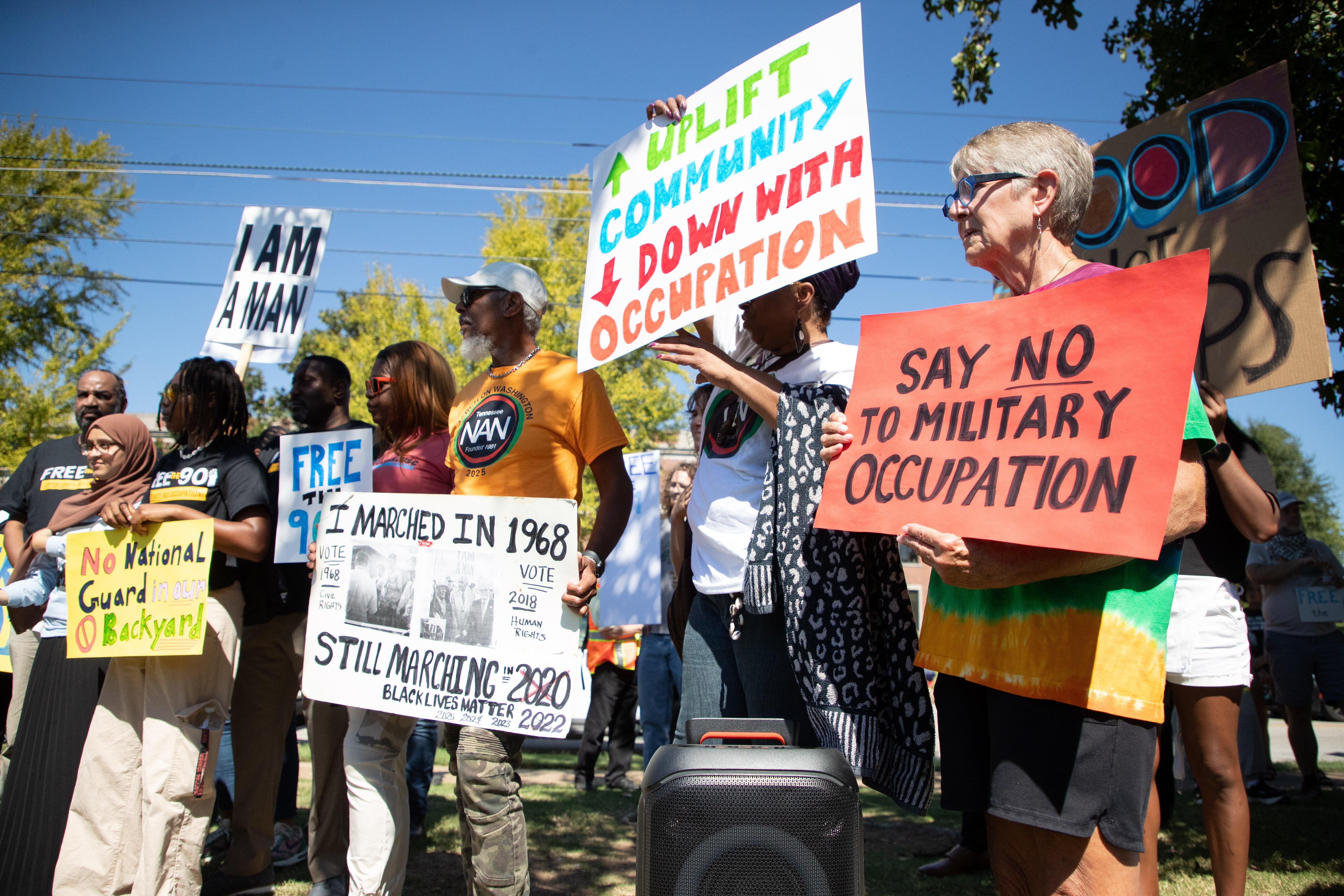 Demonstrators gather for a march in Memphis to protest against the deployment of the National Guard