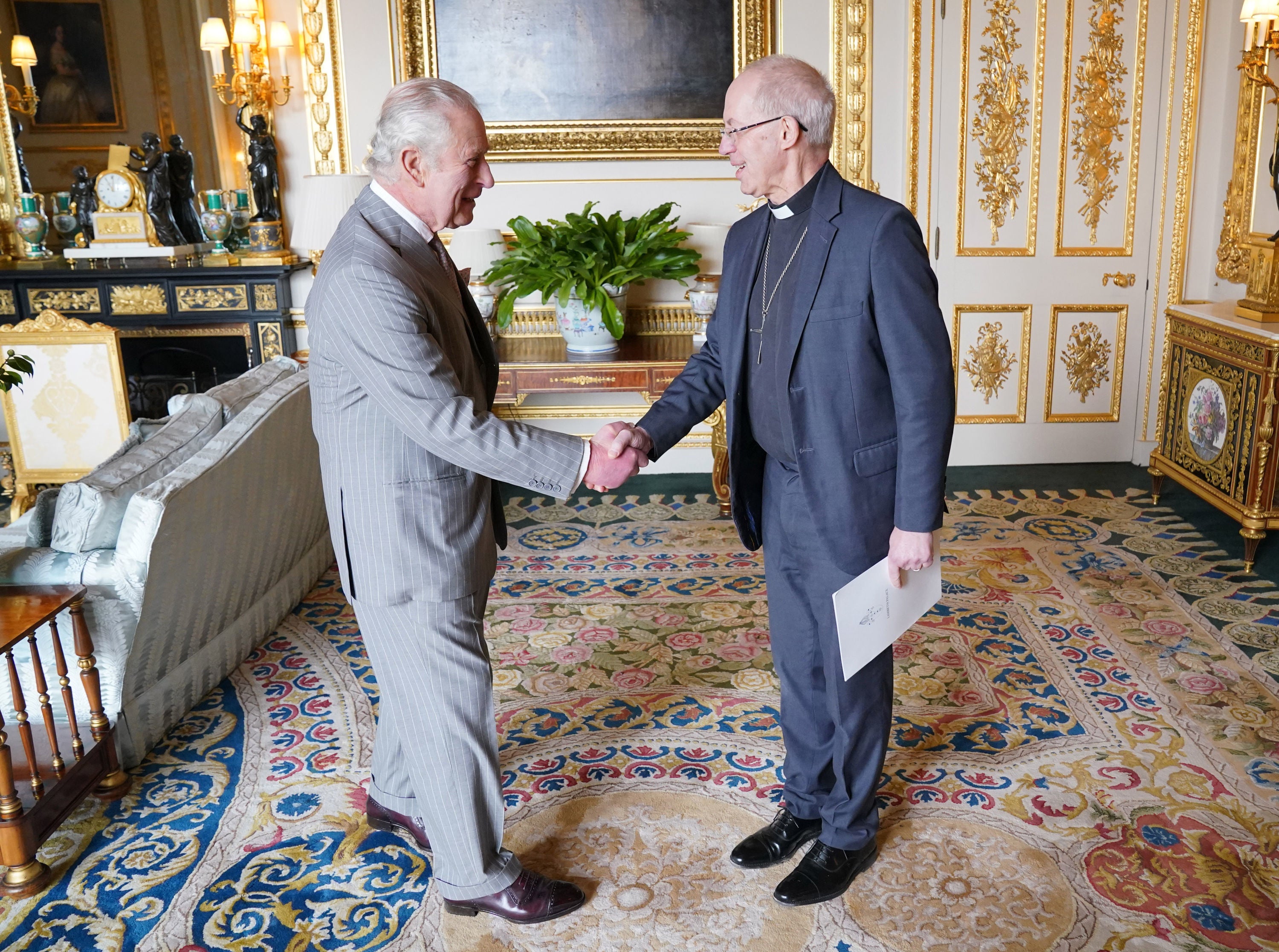 The King, pictured with former Archbishop of Canterbury Justin Welby, is technically head of the Church of England