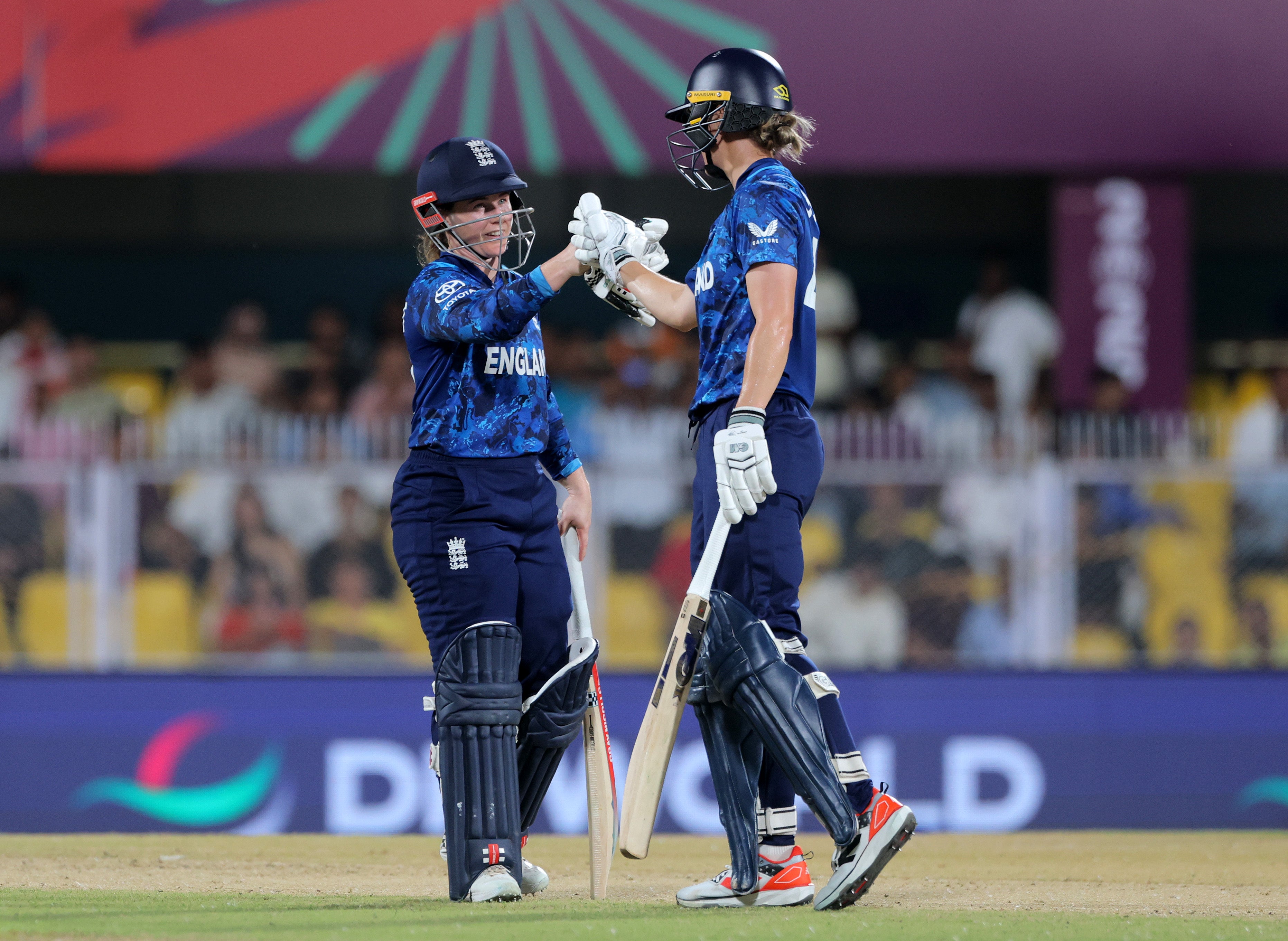 Tammy Beaumont and Amy Jones eased England home