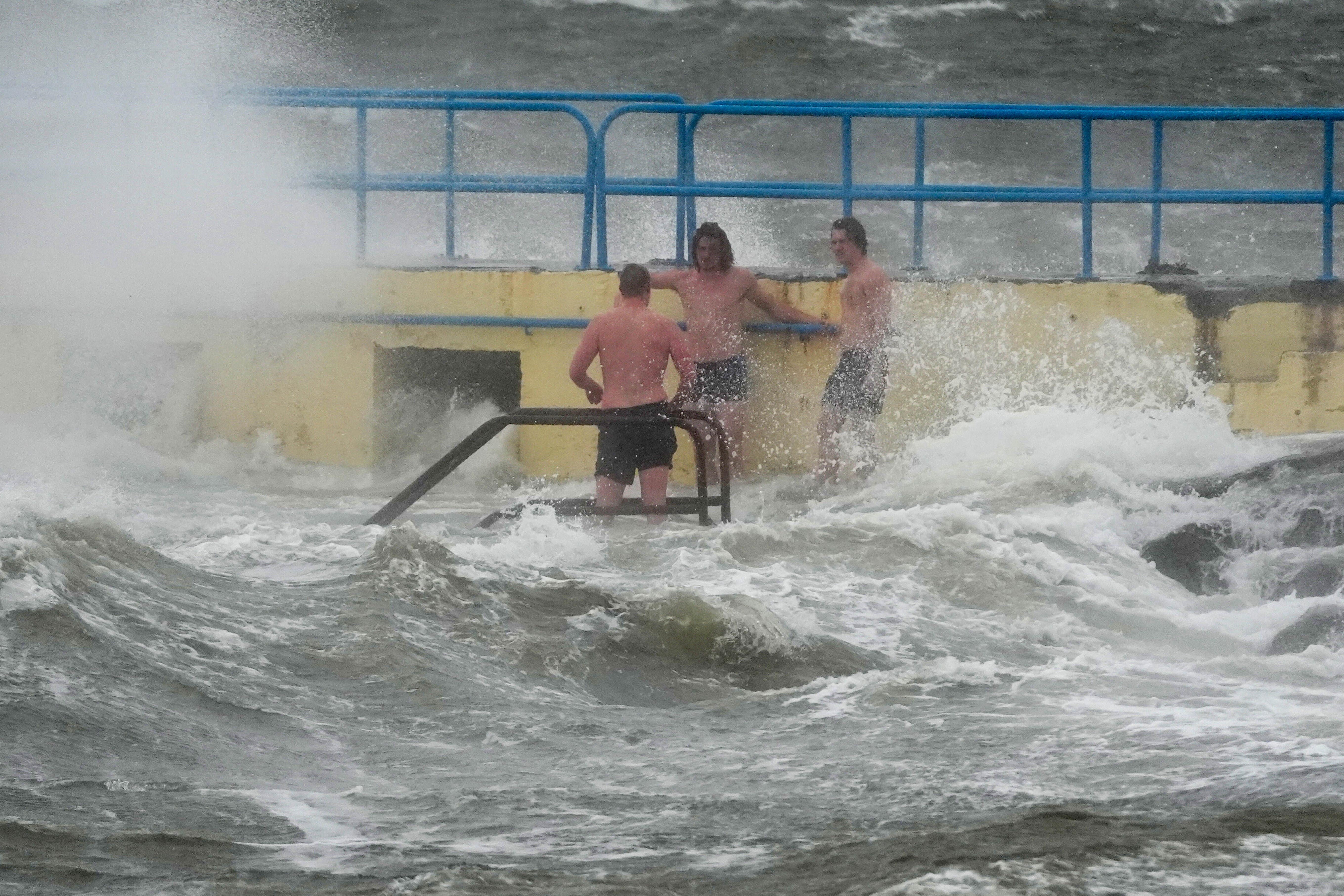People on Blackrock diving tower in Salthill, Galway (Brian Lawless/PA)
