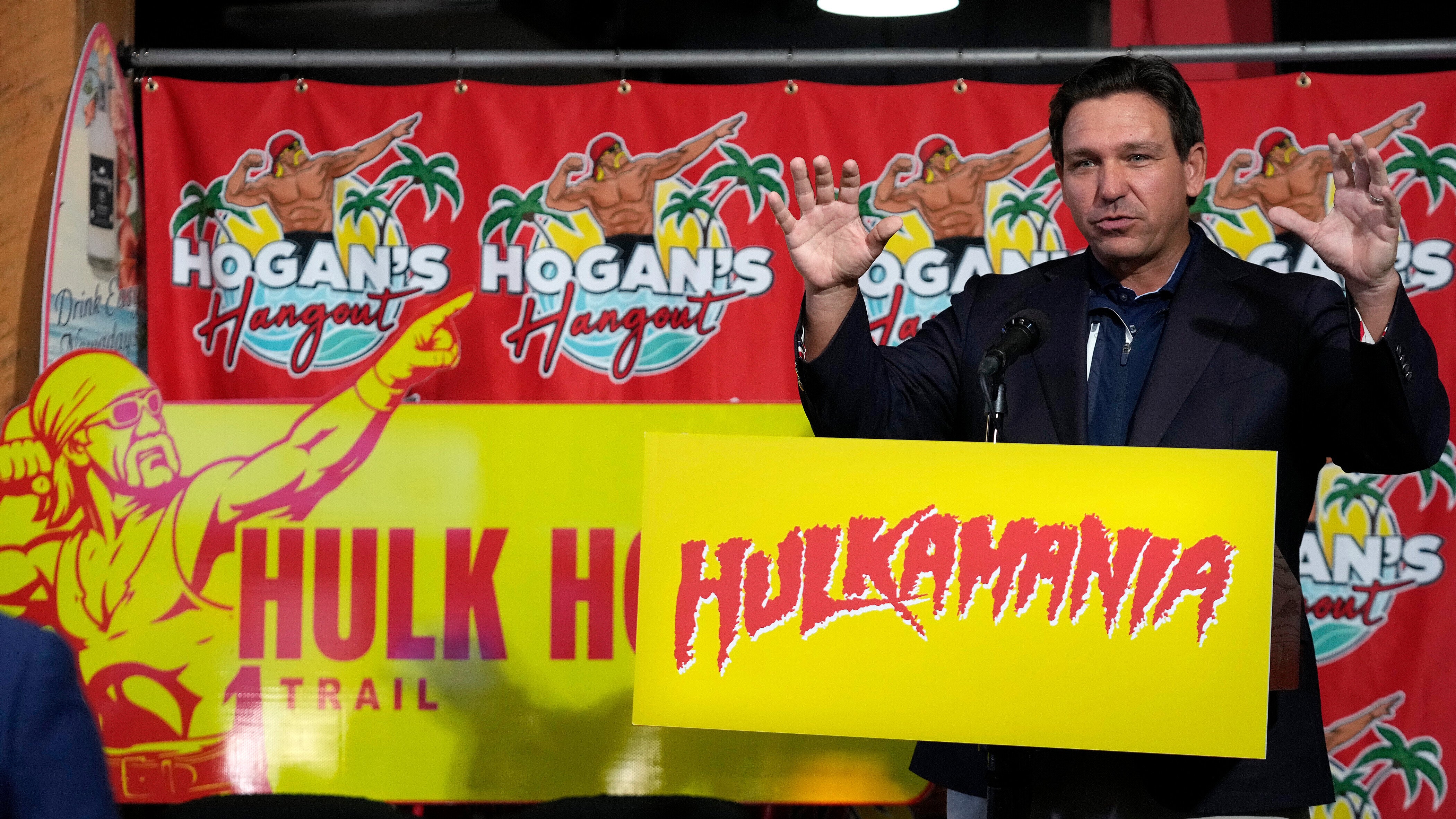 Florida Governor Ron DeSantis gestures during a news conference after naming a trail in honor of wrestling legend Hulk Hogan