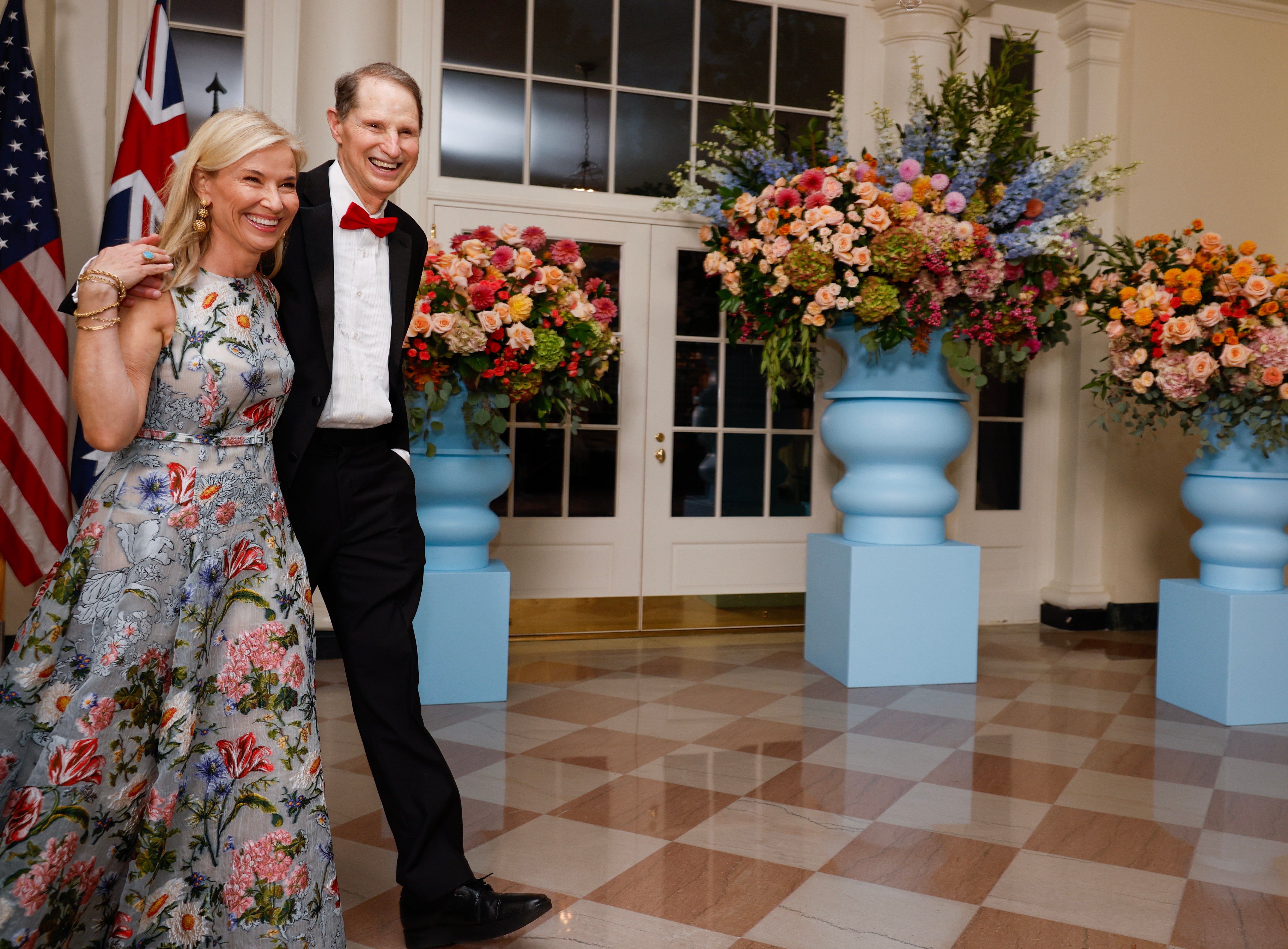 Bass Wyden, seen here with husband Sen. Ron Wyden (D-OR) arriving at a state dinner at the White House in 2023, is suing her former personal assistant over hundreds of thousands of dollars in alleged theft