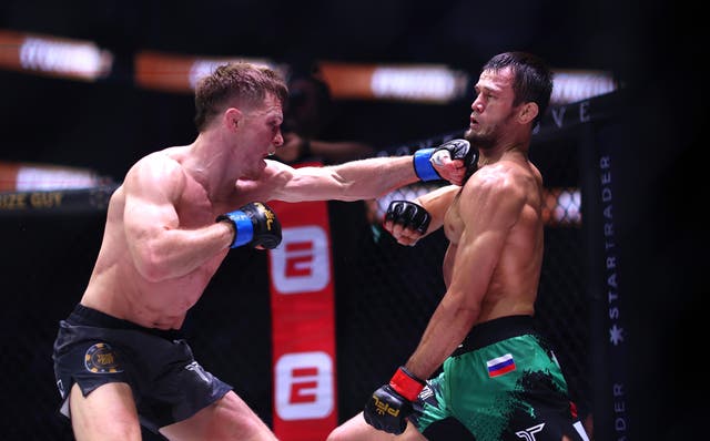 <p>Paul Hughes (left) and Usman Nurmagomedov contested an even close fight than their first clash</p>