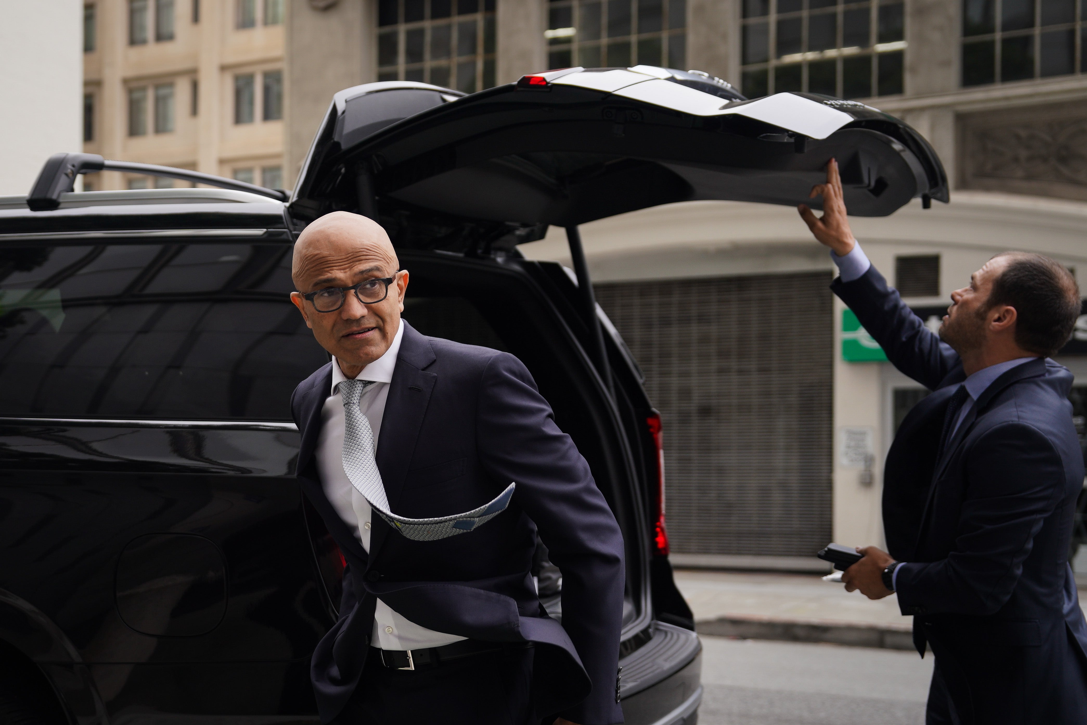 Microsoft CEO Satya Nadella arrives at federal court for a hearing about his company's merger with videogame giant Activision Blizzard. He too was in the US on an H-1B visa.