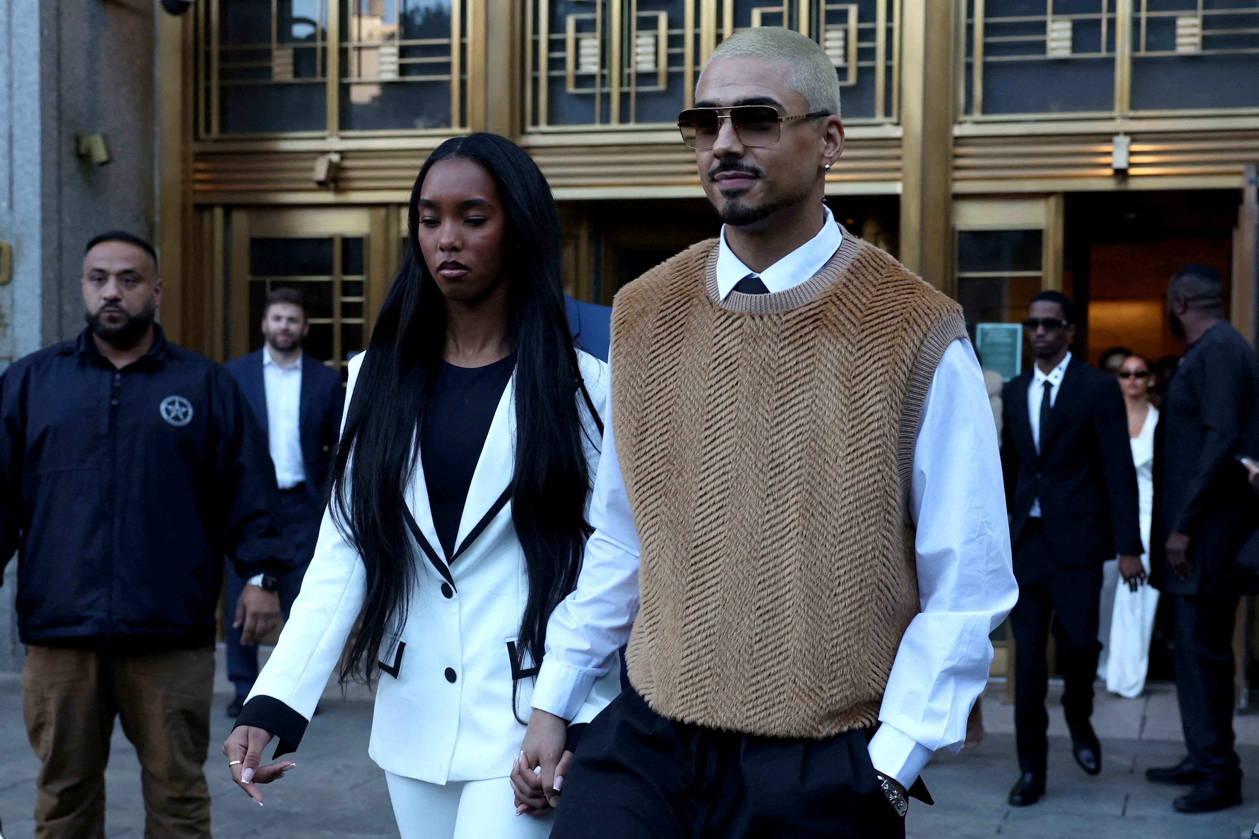 Quincy Combs and D'Lila Combs leave the court after delivering emotional pleas before their father was sentenced