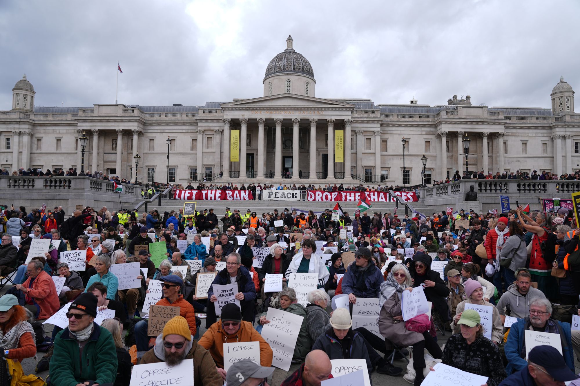 Protesters taking part in a demonstration organised by Defend our Juries, in support of Palestine Action in Trafalgar Square, London