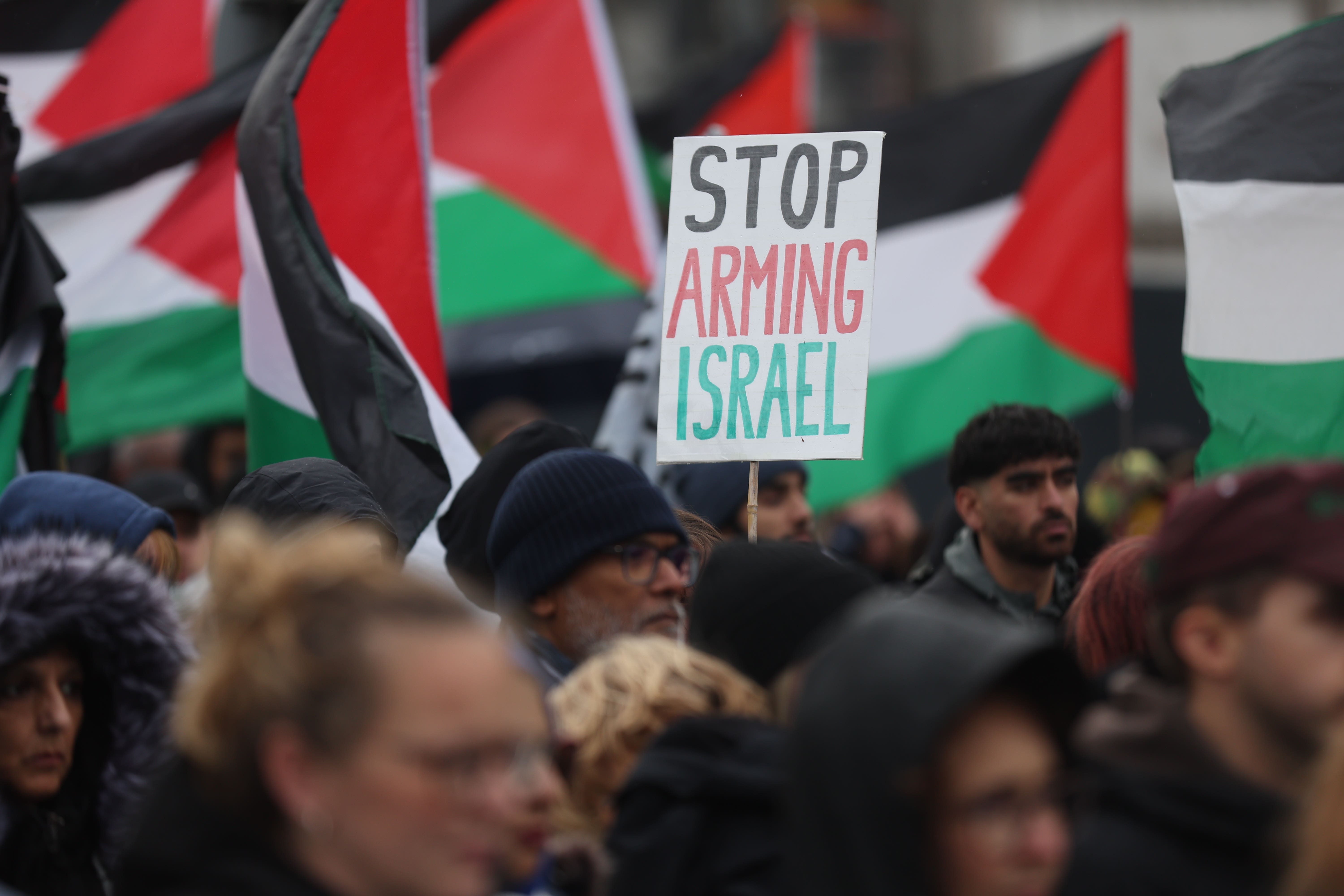 People take part in a demonstration organised by GM Friends of Palestine at Manchester Cathedral (Ryan Jenkinson/PA)