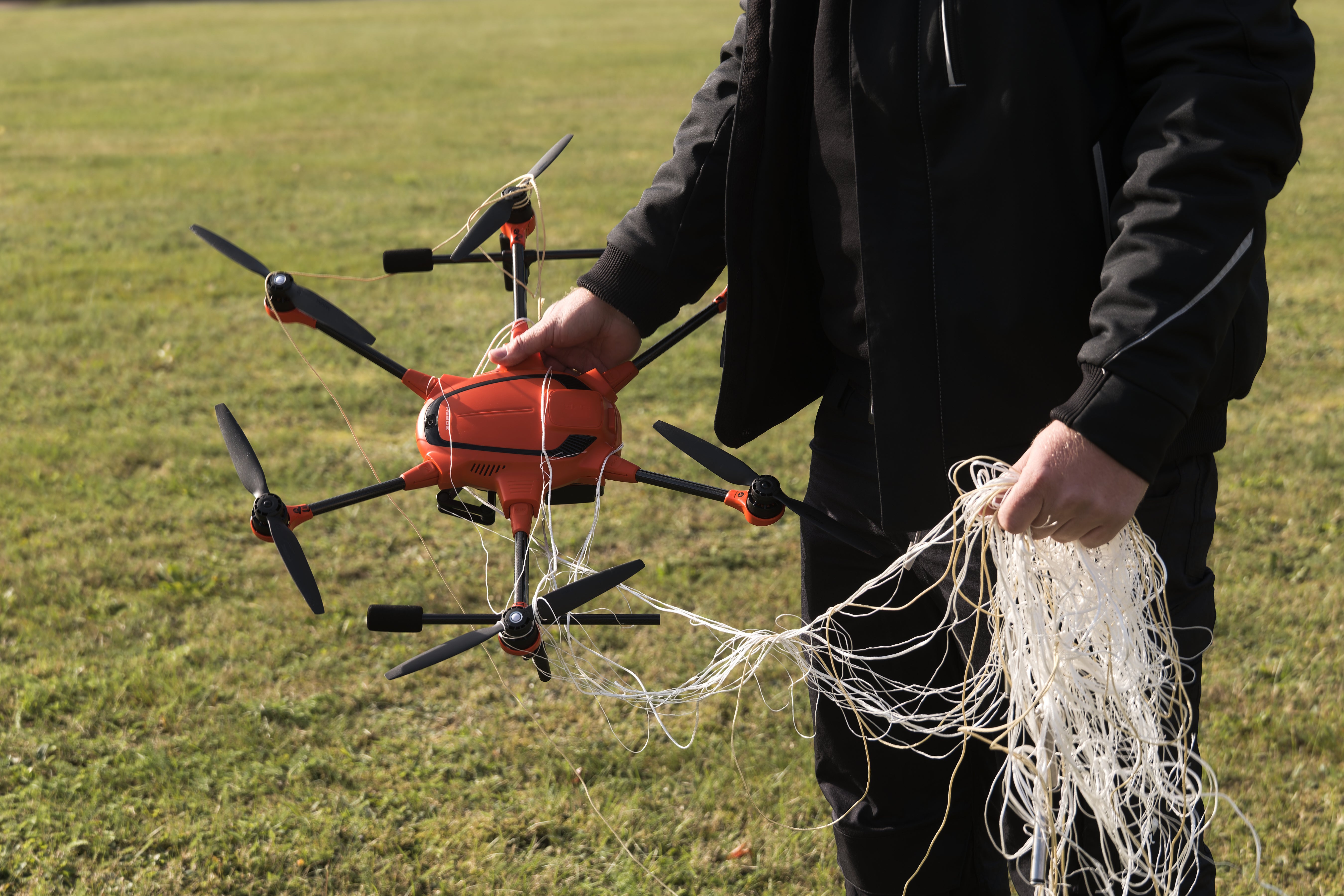 A person presents the interception of a drone by the A1-Falke interception drone from Argus Interception on the second day of the large-scale German forces Bundeswehr exercise "Red Storm Bravo" in Hamburg, Friday, Sept. 26, 2025. (Marcus Golejewski/dpa via AP)